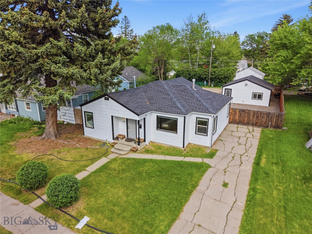 For buyers seeking easy access to MSU without being directly on a busy corridor, 718 S 14th Avenue offers one of the most practical close-in locations in Bozeman. Set in the Bozeman Main to Kagy area, this 3-bedroom, 2-bath home provides 1,689 total square feet, including 1,437 square feet on the main level and 252 square feet of basement space. The home has been well-maintained and features hardwood and tile floors, forced-air heat, a gas furnace, ceiling fans, and an updated kitchen with a dishwasher, range, and refrigerator. Updates include a newer roof, a replaced sewer line, water heater, and furnace.

The garage has been converted into a large game room, adding valuable flexible living space. While street parking in this area can be restrictive, this property offers driveway parking plus additional back-alley parking, creating room for guests or multiple occupants. Outdoor features include a landscaped yard, lawn, fencing, patio, shed, and mature trees.