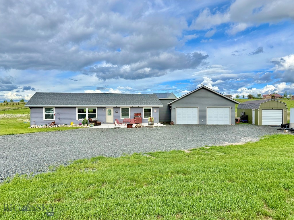 Remarkable price for this immaculate home on SIX ACRES in Harrison, Montana. Great location between Bozeman and Ennis. Ideal for a primary residence or this is a great location for a short-term vacation or long-term rental. There also is a RV hookup. Home conveys partially furnished (interior and exterior furniture) and also includes the hot tub, a 4-wheeler, and lawn mower. You will enjoy relaxing on the patio and gazing upon the Tobacco Root Mountains and Hollowtop peak. This is Montana small-town living, surrounded by recreation including Harrison Lake, the historic town of Pony, Potosi Campground/Trails, Norris Hot Springs, and the renowned Madison River for blue-ribbon fly fishing. Thousands of acres of public land for hunting, fishing, camping, and miles of trails for horseback riding and ATV adventure await. Construction of a small cabin has been approved, providing a great INCOME PRODUCING OPPORTUNITY as a short-term or long-term rental. This SINGLE LEVEL home features a split floorplan and large ensuite master. Outdoor living includes a peaceful front patio, where you may just see cowboys moving the herd. The back patio leads to a private hot tub area and large backyard. A rustic recreation room connects the home to the oversized heated garage, complete with 1/2 bath. The rec room/garage area is perfect for BBQs and entertaining. Six acres is a rare find in this area, and horses and 4-H animals are allowed. There is a 30gpm to keep the grass green. The generous-sized outbuilding has a full-size garage door for easy vehicle and equipment access and storage. Located on the outskirts of the quaint town of Harrison, where you will find a K-12 school, a cafe, a pub, and grocery store with local made goods. The local town of Ennis is ~ 25 miles and the increasingly popular Bozeman, with large anchor stores and an international airport is only 45 miles. World famous Yellowstone National Park is ~ 100 miles. Contact your agent today and embrace your Montana lifestyle.