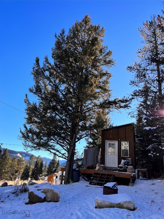 Situated in the Gallatin Canyon South area overlooking the Gallatin River drainage and close to Forest Service public lands, this tiny home and 2.0  acre lot gives you a great opportunity to build your dream home while living and working on the property.
There is a 3 bedroom septic system installed where the  tiny home is currently placed and 2 - 200 amp separate electric services.
The property is 5 miles to the entrance to Yellowstone National Park and 10 miles to Big Sky.
Walk across the street to the Gallatin River to fish or hunt, ride or hike out the back door on the hundreds of acres of Forest Service land.
