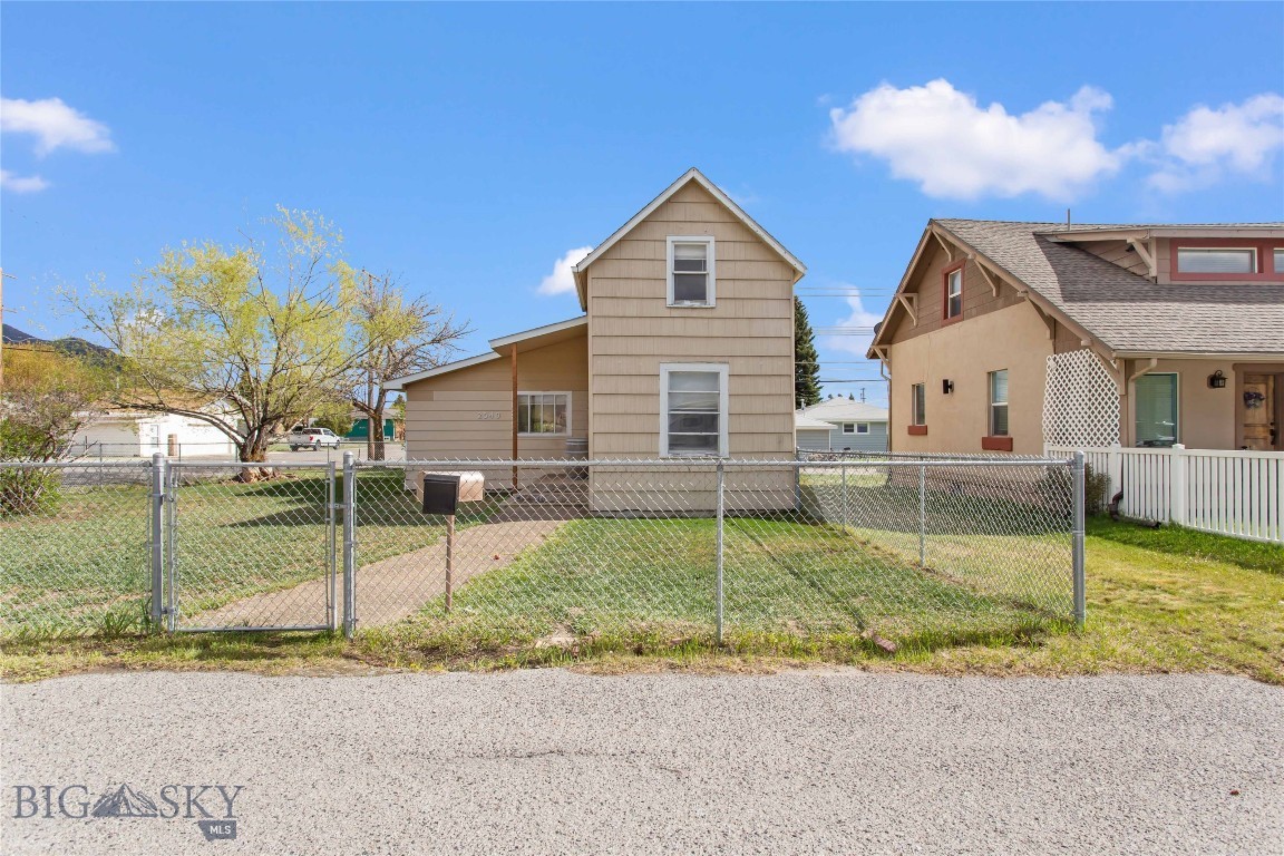 Cute and cozy 2 bedroom, 1 bathroom home located in a centrally located, desirable Butte neighborhood. This two level home offers a functional layout with comfortable living spaces and plenty of potential for a starter home, investment property, or downsizing opportunity. Situated on a large corner lot, the property features a fully fenced yard, patio area, driveway, small garage, and ample off street parking. Conveniently located in a sought after part of town with a convenient central location and easy access to all parts of Butte.