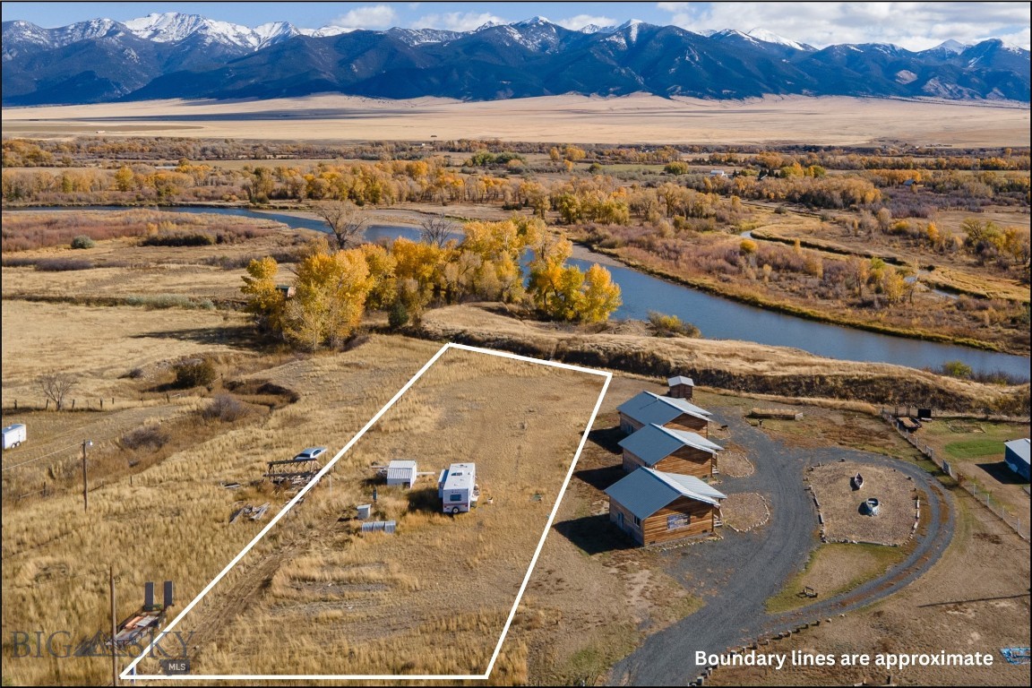 Rare .729 acre lot which is walking distance to Jefferson River. This lot has no restrictions or covenants so you can place recreational vehicles on site for any length of time that fits your needs. Manufactured or mobile homes allowed. Septic is in place along with two power pedestals for RV plug ins or build your year round home here. This lot fronts Hwy 41 N so good visibility for a commercial business if this is your focus.  Back of the lot abuts a small strip of private ground which connects to FWP land with Jefferson River frontage.  Current owner has two RV's stored on the property and a cargo trailer.  Very hard to find a lot with no covenants which will allow RV parking or allows manufactured or mobile home to be placed full time or part time. You do have access to the Jefferson River at the edge of Silver Star where there is a public access site with a boat ramp for entering or exiting the river. Pictures of the river on the listing were taken from the FWP land which is in back of the property but not on the property.