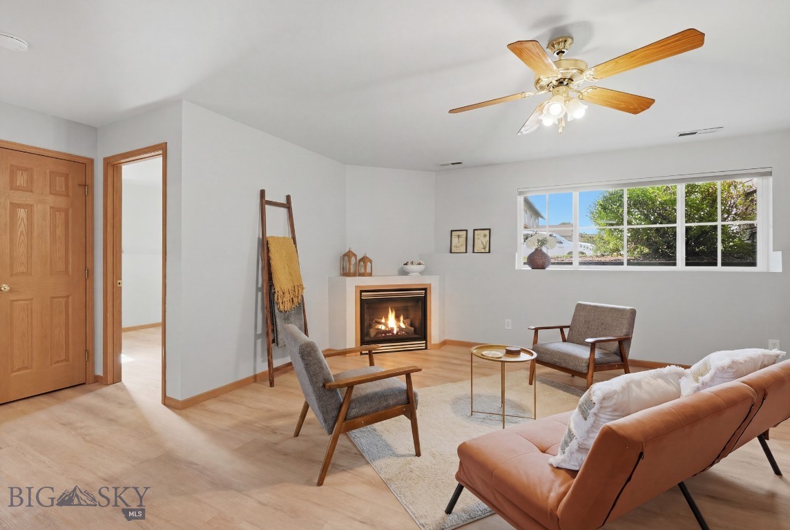 Whether you're looking for a primary residence, a lock and leave lifestyle, or a great investment opportunity, this updated 2 bedroom, 1 bathroom condo offers low maintenance living in one of Bozeman's most convenient locations. Many of the major exterior improvements were completed in 2025, including new siding, windows and screens, and a new roof. Step inside to an open concept living, dining, and kitchen area featuring engineered hardwood floors, a cozy gas fireplace, and a functional layout that's perfect for everyday living. Interior updates include new all new blinds, bathroom tile floors, toilet, kitchen sink, dishwasher, lighting, bathroom fan, smoke and CO detectors, and a new front door lock and deadbolt. The functional design helps keep the home naturally cooler during the summer. A detached one car garage provides convenient parking and additional storage. Ideally located just minutes from Montana State University, shopping, restaurants, parks, and Bozeman Pond Park, this home offers easy access to everything Bozeman has to offer while providing a move in ready opportunity with many of the major updates already completed. Water/sewer and garbage are included in the HOA dues.