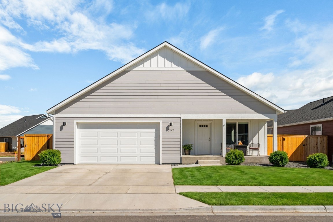 Now offering a $10,000 buyer incentive! Better than new, this West Post home stands out among comparable homes with thoughtful upgrades and improvements that set it apart. Just over a year old, it offers the feel of a new home with added value already in place, making it truly move-in ready. Positioned on a desirable corner lot adjacent to a pocket park, the home enjoys a sense of openness and beautiful Bridger Mountain views from the backyard—an ideal setting for relaxing or entertaining. Inside, vaulted 14’ ceilings and a bright, open layout create a spacious, airy feel. The tri-level floor plan offers flexibility and privacy for guests or family, with four bedrooms, three full baths, and a bonus room ideal for a second living area. What sets this property apart is the level of finish and outdoor living already in place. Central A/C, a landscaped and fenced yard with extended patio space, quartz countertops, a finished garage, and an in-home water softening system come together to create a space that’s easy to enjoy from day one. Located in the growing West Post community, residents enjoy parks, a pond, and walkable trails, all while being just minutes to the airport, I-90, and a convenient drive to Bozeman, Big Sky, and everyday amenities.