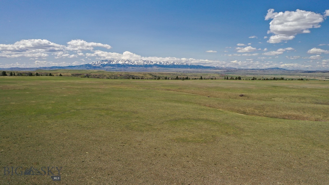 A unique opportunity to acquire a piece of unspoiled potential. This generous expanse of 232+/- acres just 8 miles east of Big Timber MT presents a canvas for your vision, offering a blank slate for your dreams to take root. It provides ample room for whatever you decide to do. Agriculture, residential, or both. The views of the Crazy Mountains to the west and Beartooth Mountains to the south enhance the appeal of the land. If you are an investor or someone looking to build your home and have a few animals you should secure this exceptional piece of land today. 2 developed springs and easy access off of maintained county road.