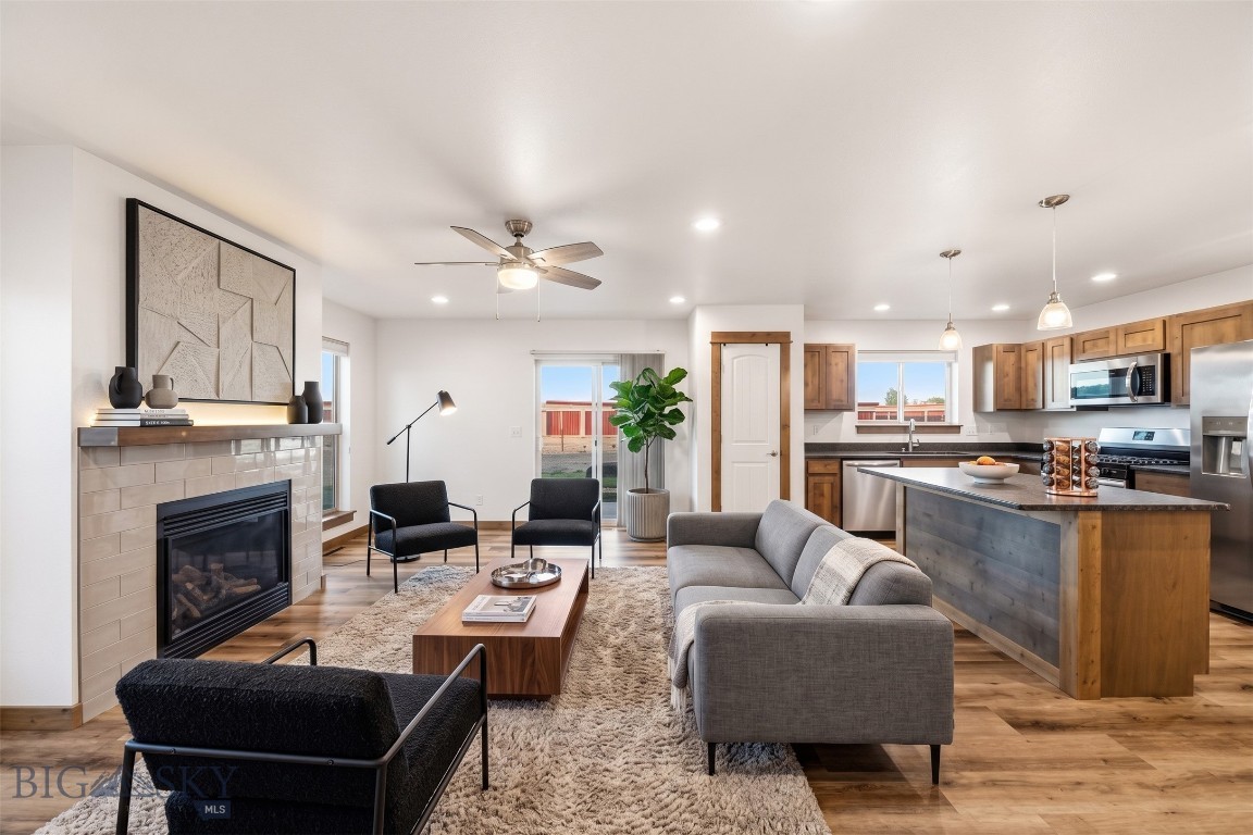 Newer townhome in Northwest Belgrade, lightly lived in since its 2022 completion, located in the Cloverleaf Meadows Subdivision near Story Creek Elementary. This well-designed floor plan features an open-concept living, dining, and kitchen area with abundant natural light, extra-large windows, and a cozy gas fireplace, plus central A/C.

Upstairs offers a spacious primary suite with Bridger Mountain views, double vanity, and walk-in closet, along with two additional bedrooms, a full bath, loft area, laundry room, and ample storage. Enjoy great curb appeal, a landscaped yard with underground sprinklers, and no direct neighbors behind. Conveniently located just minutes from downtown Belgrade, BZN Airport, and Bozeman.