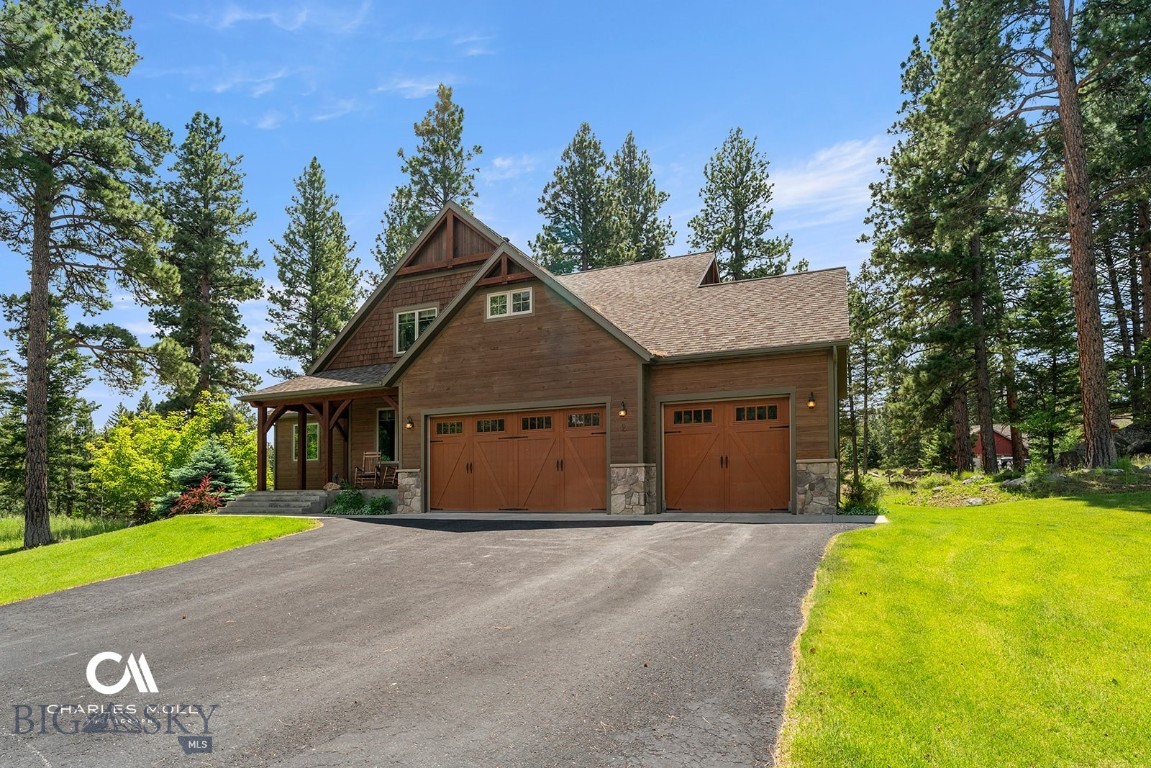 Set within the highly desirable Jack Mountain Estates in Clancy, this exceptional timber-frame residence offers a rare blend of refined luxury and Montana beauty on 1.2 +/- private acres. The secluded lot features mature Ponderosa Pine trees creating a very private setting. Designed for effortless main-level living, the home showcases warm walnut flooring, a vaulted great room anchored by a gas fireplace, and custom built-ins. The primary suite, gourmet kitchen with generous pantry, and dedicated office make everyday living easy. Upstairs you'll find two spacious bedrooms, a full bathroom, and a versatile flex space. The expansive lower level is equally impressive, featuring a spacious family room, two additional bedrooms, and a full bath—ideal for guests or multi-generational living. The property is nicely landscaped, with raised garden beds, and irrigation to enhance the setting. It’s not uncommon to see elk, deer and other animals passing through. A three-car garage, new furnace, fiber internet, and easy paved access to Helena ensure convenience without compromise.