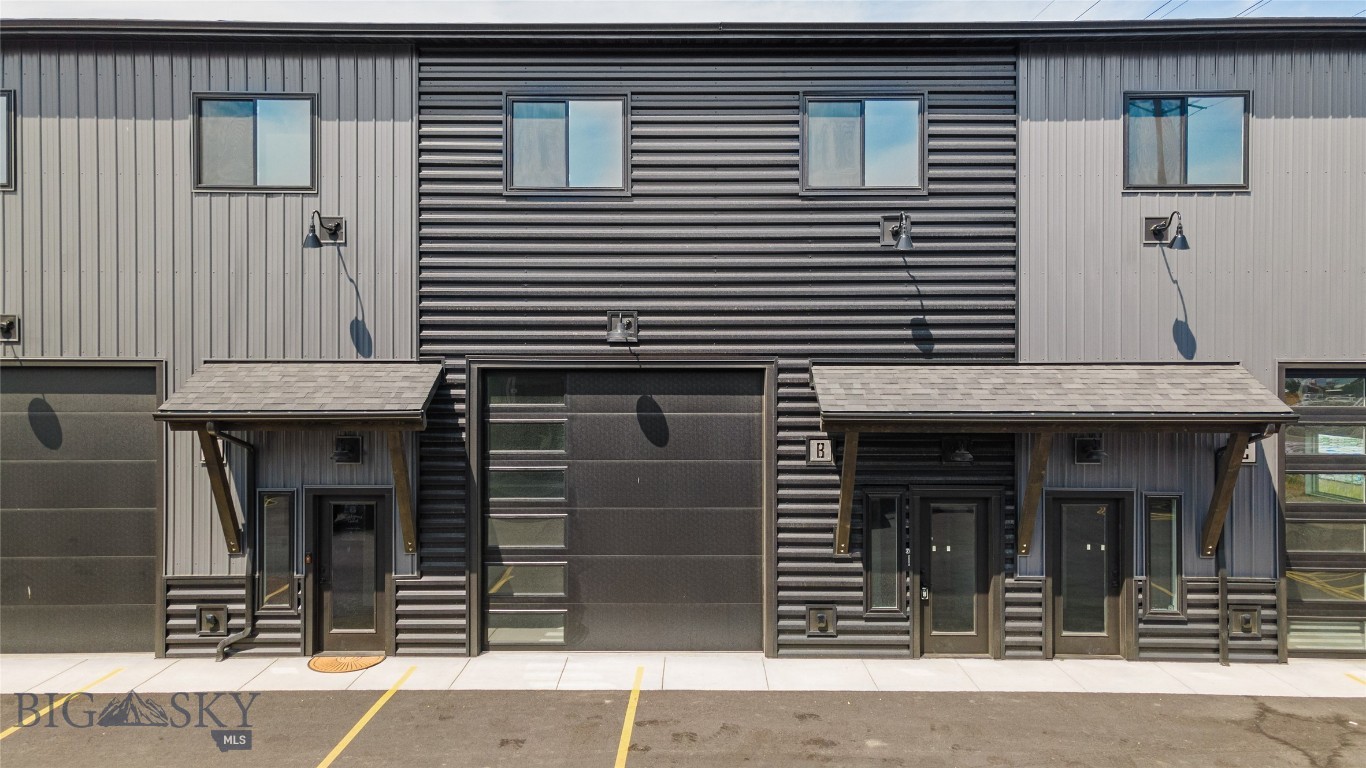 Leased live/work investment with stable in-place income and longer-term lease security in the high-growth Jackrabbit corridor. Built in 2025, this modern mixed-use unit offers predictable cash flow with future owner-user potential.
Unit B is leased at $46,200 annually through July 2027, providing dependable income with over two years of remaining term. Ideal for investors seeking stable returns or future owner-users looking to secure a high-quality space with income in place.
The ground floor features approximately 1,240 SF of commercial/shop space with a 12’ x 12’ overhead door, private office, and bathroom—well suited for contractors, trades, or small businesses.
Upstairs, the residential unit includes approximately 1,170 SF with two bedrooms, two full bathrooms, open-concept living, walk-in pantry, in-unit laundry, and a private balcony.
Live/work units of this quality are limited in the market, with strong demand for flexible industrial/residential space. Low-maintenance, new construction in one of the Gallatin Valley’s fastest-growing commercial corridors.