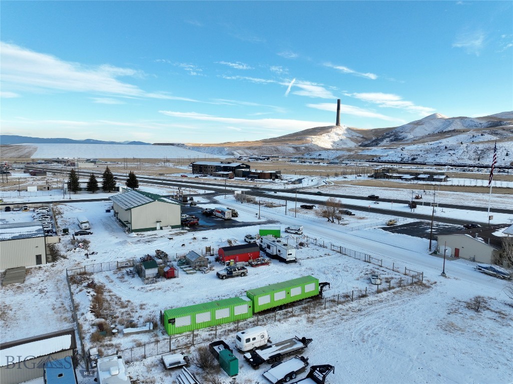 Two commercial lots with high visibility from Highway 1! These two lots combine to total just under one acre of land under commercial/light industrial zoning on the east end of Anaconda, MT, an area booming with commercial development and several newly established, successful businesses including Murdoch’s, O’Reilly Auto Parts, Black Diamond Car Wash, She Brews Coffee, The Forge Hotel, Barclay II Supper Club, APOC World - a sporting goods and firearms store, and more. This particular location has an exceptional traffic count and sees an average of over 10,000 vehicles pass by per day creating an incredible opportunity. Three phase power is on the property and water has been plumbed into the property off the main line, which is located in Montana Drive near the south property boundary. Additionally, sewer is located in the alley right of way near the North boundary. This land is a blank slate for a new exciting business venture in the heart of southwest Montana!