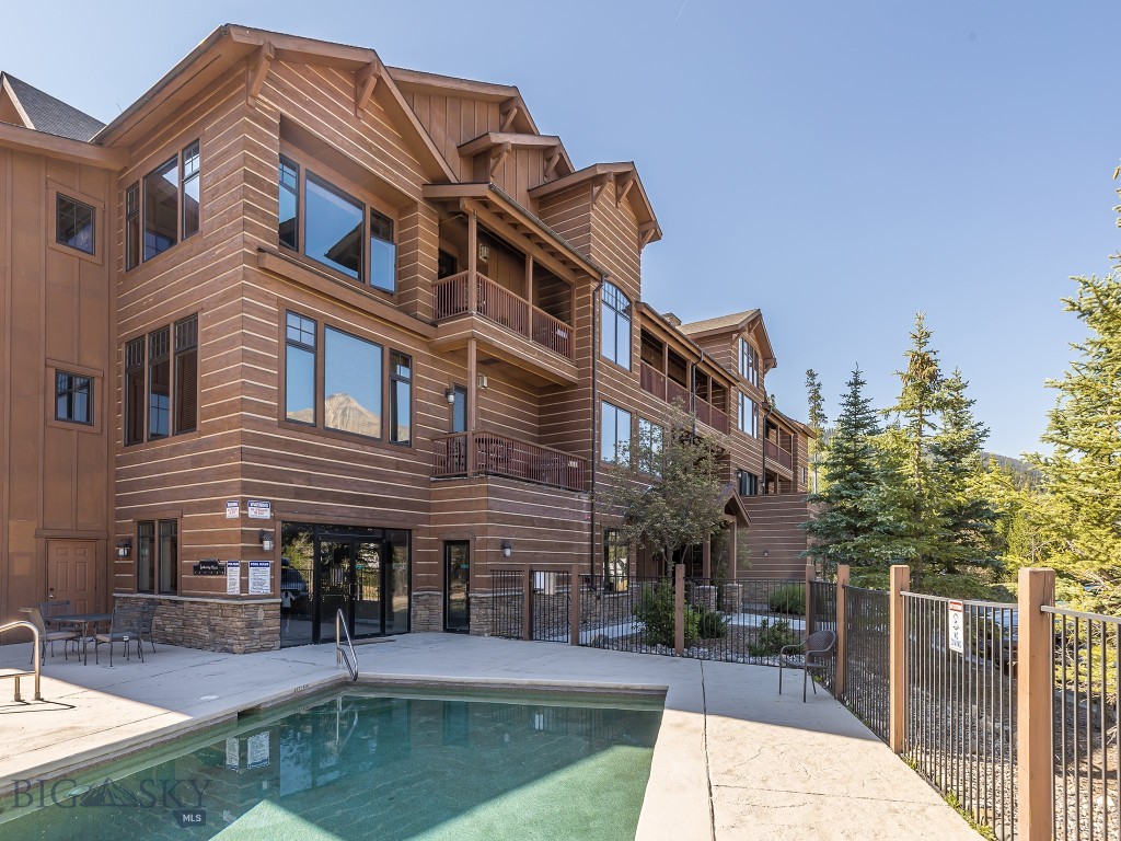 Take in breathtaking Lone Peak views from this stunning 3 bedroom, 3.5 bath Mountain Lake condo. This mountainside retreat offers luxurious single-level living with high end finishes like custom coffered ceilings, premium cabinets and countertops, new Thermador and Bosch kitchen appliances and 8' solid wood doors. Offered tastefully furnished for a seamless move-in experience. Mountain Lake condos are serviced by an elevator for privacy and easy access to the top floor unit. Step onto the deck and enjoy your morning coffee or cozy up in front of the stone fireplace after the days activities. This condo boasts direct access via a private stairwell to the amenities: swimming pool, hot tub, fitness and rec room and heated garage for your car and toys. The complimentary community shuttle service will take you to and from the base area for fast and easy access to skiing!