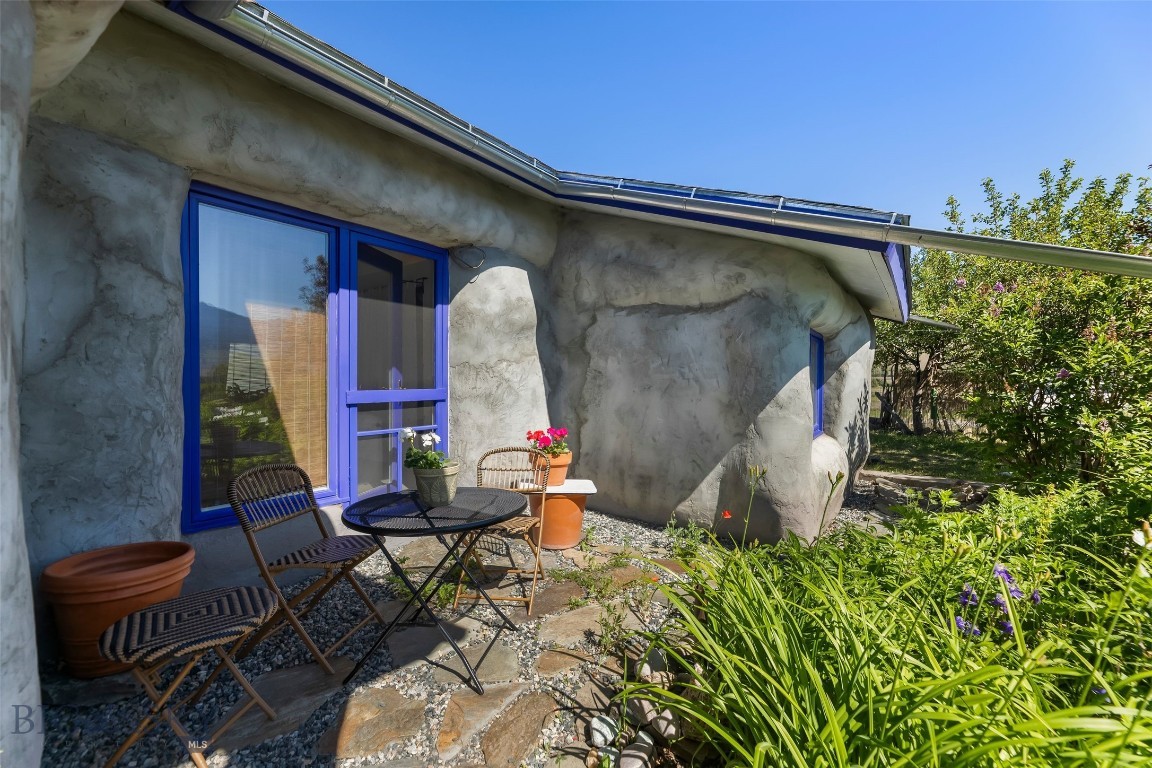 Nestled in the heart of Paradise Valley, this charming listing captures the beauty of Montana with picturesque views of the  Absaroka Mountains. Bright, airy, and effortlessly inviting, the home evokes the timeless charm of a French country cottage, where every space feels warm and welcoming. Outside, lush lavender, colorful perennial gardens, mature conifer trees and shrubs are thoughtfully landscaped around the perimeter of the home providing privacy and visual appeal. Beyond the gardens, an expansive stretch of neighboring open land to the east is protected by a conservation easement providing an uninterrupted backdrop of natural beauty.  A private pedestrian easement to the Yellowstone river is also part of this neighborhood.  This is a rare opportunity to experience country living with a European feel in one of Montana's most desirable locations.
BUYERS AND THEIR AGENTS ARE OBLIGATED TO DO THEIR OWN DUE DILIGENCE REGARDING ALL ITEMS RELATED TO PROPERTY AND ITS CONDITION. INCLUDING BUT NOT LIMITED TO, SQUARE FOOTAGE, ZONING, ACCESS, WATER RIGHTS, USE RESTRICTIONS, ETC.  INFORMATION PROVIDED BY SELLERS, THEIR AGENTS AND THIRD PARTIES IS DEEMED RELIABLE, BUT NOT GUARANTEED.