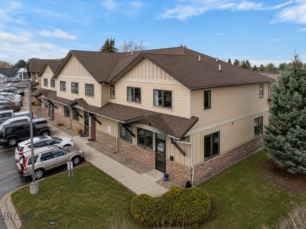 Don’t miss this opportunity at this thoughtfully laid out, single level, 984 square feet, 2-bedroom, 1 bath condo, upper level, end unit with Bridger Mountain views located central to all things Bozeman. With a super functional design, this cute, easy to “lock and leave” property has only had two owners and is in great condition featuring a completely updated kitchen, bath and lighting. The updated open concept kitchen boasts stainless steel appliances and a stainless single basin sink, while both the kitchen and bath have upgraded quartz countertops,  and beautiful cabinetry. The open living area flows easily into the kitchen, creating a welcoming space for daily living and entertaining. Large windows invite natural light while offering views of the surrounding area and nearby mountains. The kitchen provides ample cabinetry and workspace, with room for casual dining or gathering. Two bedrooms provide flexibility for guests, a home office, or additional living needs, while the full bathroom and in-unit laundry area add everyday convenience. Central air conditioning and forced-air heat with HEPA attachment to the furnace help ensure comfort through all seasons. Positioned just off Durston Road, this location offers easy access to nearby parks, trails, recreation, shopping, restaurants, downtown, Montana State University, and Bozeman Yellowstone International Airport while still providing a comfortable residential setting. Whether you're seeking a primary residence, a foothold in the Bozeman market, or an investment opportunity, this property offers a practical and appealing option central to it all with one of the best prices in the Bozeman market. This artful space has been well cared for and offers a low-maintenance lifestyle, only moments from all things Bozeman.