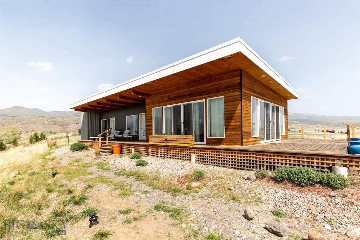Sitting high on a beautiful corner lot overlooking more than 3 acres of gently rolling Montana landscape, this modern 2 bed, 2 bath home captures sweeping, unobstructed views of the Yellowstone River and the iconic peaks of Paradise Valley. The setting is nothing short of incredible. Inside, the home is turn-key and thoughtfully finished. Clean, bright, and comfortable, it’s ready for full-time living, a private getaway, or a continued income-producing investment. With a proven track record as a successful short-term rental, the property offers established revenue and opportunity for those looking to step into Montana’s thriving vacation market. Home will convey mostly furnished, providing a turn-key offering. The location balances privacy with convenience. Just minutes from Emigrant, 20 minutes to the north entrance of Yellowstone National Park, and 30 minutes to Livingston, you’re surrounded by world-class fly fishing, endless hiking, natural hot springs, and year-round adventure. Whether you’re seeking a basecamp for exploring or a quiet retreat to simply soak in the views, this property delivers Montana living at its best.