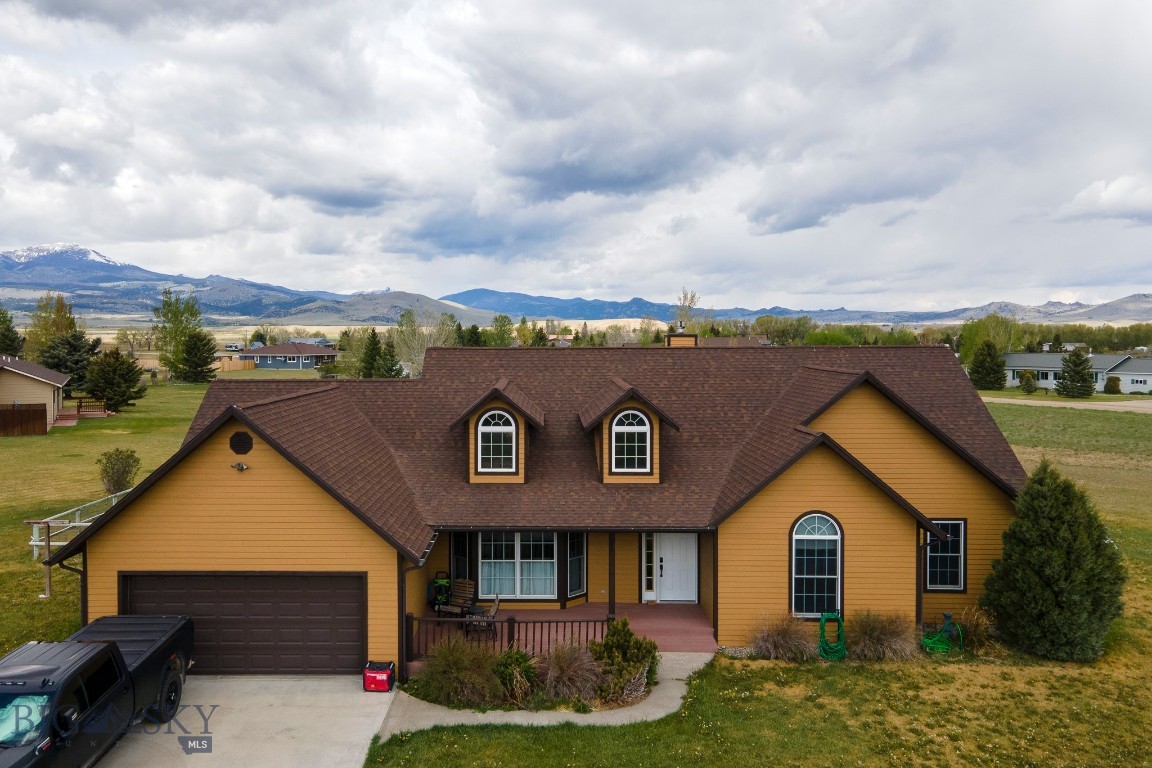 22 Coachman is not one to miss. Inside of this wonderful home, you will find 4 bedrooms, 2 baths, and ample entertaining space. Step outside to the large 1.72 acre lot, where you can enjoy the incredible views the Madison Valley has to offer from every direction. Soak in your hot tub off the covered patio, and plenty of space to store all your toys. There is a perfect storage shed, complete with power and a circle drive for ease of access in and out of the property. The landscaped yard is a perfect space to unwind during those Montana summer nights. Situated just outside of Ennis, Montana, the outdoor recreation possibilities are endless from this home. Don't miss your opportunity to view this amazing home today.