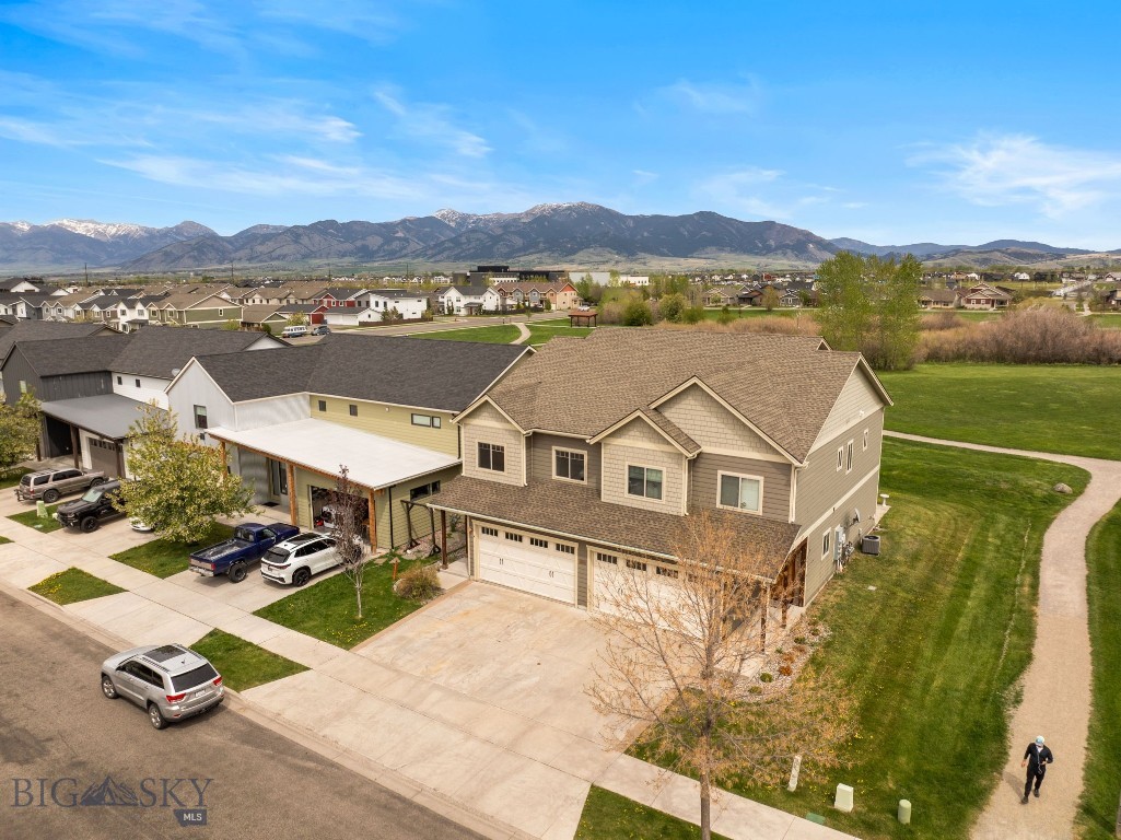 Welcome to your dream home, where breathtaking Bridger Mountain views and modern comforts come together in a truly exceptional setting. Perfectly positioned beside a stunning 7-acre park, this inviting residence offers a peaceful backdrop and an enhanced lifestyle. Expansive windows fill the home with natural light while showcasing the beautiful park landscape and spectacular mountain vistas. Whether you're relaxing indoors or enjoying the surrounding open space, you'll appreciate the seamless connection to nature and the serene atmosphere this remarkable property provides. 

As you step inside, you’ll appreciate the seamless flow of the open floor plan, ideal for relaxing or entertaining. The cozy gas fireplace invites warmth and comfort on chilly evenings, creating an ambiance that feels like home. The spacious kitchen is a culinary enthusiast's delight, featuring a pantry for ample storage and proximity to the living area, ensuring you’re always part of the action.

Retreat to the oversized primary suite, boasting a luxurious tiled shower, a separate tub for unwinding after a long day, and dual sinks for effortless morning routines. With an impressive walk-in closet, organizing your wardrobe is a breeze. Upstairs, you’ll find a convenient laundry room, making daily tasks more efficient.

Two additional generously sized bedrooms provide flexibility for guests or a home office, accommodating all your needs. With breathtaking mountain views and proximity to Bozeman's schools and shopping, the location perfectly balances tranquility with accessibility. Don't miss this opportunity to make this stunning property your own—schedule a viewing today!