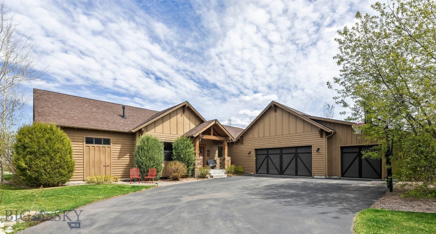 Experience the perfect blend of craftsmanship, comfort, and Montana beauty in this thoughtfully updated home set on 1.392 acres in a quiet cul-de-sac setting. Designed for both everyday living and elevated entertaining, this residence offers an inviting open floor plan filled with natural light from expansive windows that frame breathtaking views of the Bridger Mountains, Frog Rock, and the south valley foothills.
At the heart of the home, a centrally located custom kitchen showcases quartz countertops, high-end stainless steel appliances, and stunning architectural details—including a custom wood inlay ceiling, exposed wood beams, and metal accents that carry throughout the home. Refinished wood floors and a cozy wood-burning fireplace anchor the open, vaulted living space, creating warmth and timeless style.
With five bedrooms—or four plus a dedicated office—this home offers flexibility to fit your lifestyle. Each bedroom features a walk-in closet, while the spa-inspired primary suite provides a true retreat with a soaking tub, travertine tiled shower, expansive closet, and private patio with direct access to a hot tub for a serene, spa-like experience. Two additional bedrooms are thoughtfully positioned with a Jack-and-Jill bathroom, separate from the primary suite for added privacy.
The lower level is built for entertainment, complete with a billiards area, wet bar, theater room, and a full guest suite featuring a marble-tiled steam room—perfect for hosting or unwinding.
Step outside to enjoy expansive outdoor living spaces, including a large back patio ideal for taking in the panoramic views, a covered front porch, and beautifully landscaped grounds with mature trees, garden beds, and full irrigation for effortless maintenance. The fenced backyard offers privacy while the property borders open space and trail systems on two sides—providing immediate access to miles of trails right out your door.
Additional highlights include an oversized 3-car garage with ample room for vehicles, gear, and storage, as well as proximity to hiking trailheads and National Forest access just minutes away. All of this, while being only 15 minutes from downtown Bozeman for dining, shopping, and entertainment.
This is Montana living at its finest—where luxury meets landscape, and every detail is designed to be enjoyed.