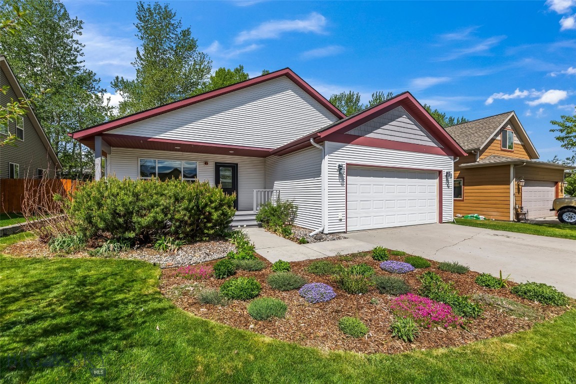 This charming single-level home offers the perfect blend of comfort, style, and convenience. From the moment you arrive, the inviting curb appeal and covered front porch create a warm, welcoming first impression ideal for relaxing mornings or greeting guests. Inside, the open-concept floor plan provides a seamless flow between the living, dining and kitchen areas, making it perfect for both everyday living and entertaining. The kitchen is perfect for all your culinary pursuits, you won't lack counter space. A large dining area will provide for plenty of guests and easy access to the patio to take your dining outdoors. Large windows invite in plenty of natural light, enhancing the home’s airy and spacious feel. Step outside to enjoy the fully fenced backyard, featuring mature landscaping and large trees behind that adds shading, privacy and character. There are raised garden beds ready to begin your summer gardening projects. The oversized patio offers plenty of space for outdoor dining and entertaining or simply unwinding in your own private retreat. The patio is accessed from both, the dining area and the master suite, by sliding glass doors. Located in a great neighborhood with easy access to town, just around the corner from a park and a pond. This home combines country living just minutes to town with everyday convenience making it an ideal place to call home.