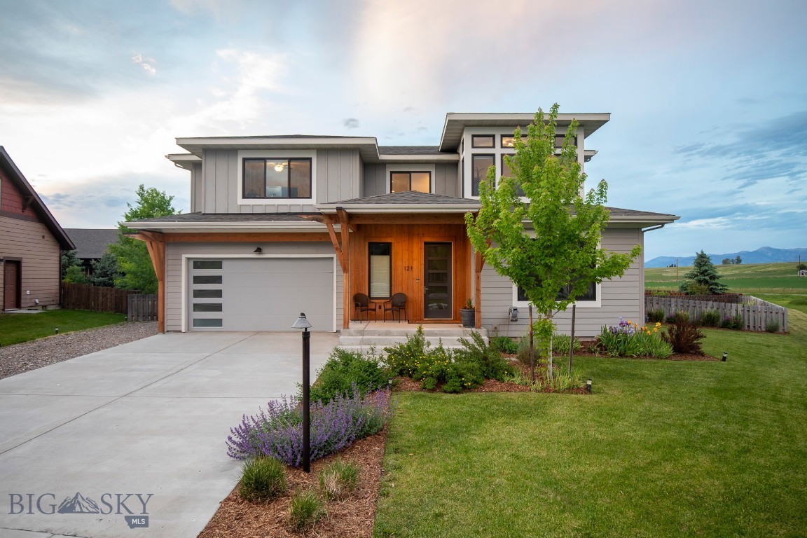 This contemporary 2020-built home in the desirable Elk Grove Subdivision sits on over a third of an acre and offers a blend of comfort, style, and thoughtful upgrades. Recent improvements include new interior paint, new carpet, a new Bluetooth central air system, and a newly installed soft-water system with a whole-house chlorine-removing carbon filter, providing added efficiency and convenience.
Large windows and dual sliding patio doors fill the main level with natural light, while a gas fireplace creates a warm and inviting focal point. The spacious kitchen features stainless steel appliances, granite countertops, a tile backsplash, pull-out cabinet shelving, and a walk-in pantry for exceptional storage.
The main level includes a comfortable guest bedroom with a walk-in closet and private access to the 3/4 bath. Upstairs, the primary bedroom offers a relaxing retreat with a soaking tub, walk-in shower, and large walk-in closet. Three additional bedrooms and a spacious bonus room provide versatile options for a variety of needs, whether for work, recreation, or additional sleeping space.
Outside, enjoy the fully fenced yard, included hot tub, and expansive Montana views. A backyard shed and extra garage storage add even more functionality. With its modern updates, generous layout, and well-designed outdoor space, this property is truly move-in ready.