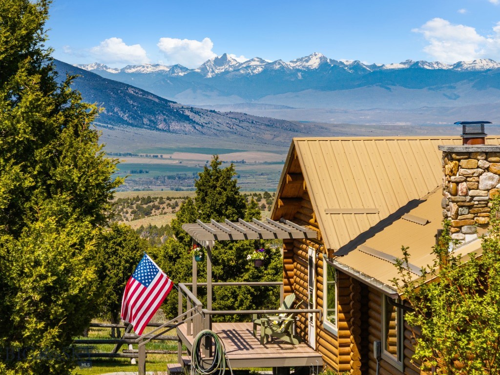 This is what Montana is all about! Mountain views surround you from this 40 acres bordering BLM land at the base of the Tobacco Root range. This impeccably cared for and maintained property features a 2 bed/2 bath cabin with a 1 car basement garage. There is also a detached 2 car garage with a large, finished room above -perfect for storage or guest overflow. A detached hot tub/sauna house is ideal for relaxing and taking in the amazing views during all seasons. A deck wraps around 3 sides of the main cabin providing a great space for entertaining and enjoying the surrounding beauty as well as frequent wildlife visitors. An outdoor recreationalist’s paradise awaits just a couple of miles up the road with public access to the National Forest.