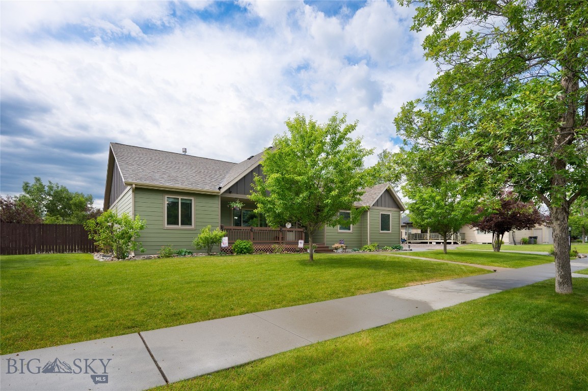 Turn-key Perfection in the highly sought-after Landmark Subdivision!  This beautifully updated 5-bedroom, 3 bath home on just over a half acre is TRULY move-in ready. Major investments completed within the past 3 years include paid in full PV Solar system, new roof, new siding, new windows, new French doors, and a new water heater.  Additional upgrades include a Kinetico water softener, updated kitchen appliances and guest bathroom, Jellyfish permanent exterior lighting and a RV dump. 

Inside, the inviting covered front porch leads to a spacious living room with vaulted ceilings, a cozy gas fireplace, and an open layout that flows into the kitchen and dining area with easy access to the large deck for seamless indoor/outdoor entertaining. The main level features a private primary suite with a walk-in closet and ensuite, plus 2 additional bedrooms.  Including a bonus flex space currently used as the "Bobcat Room" with a kegerator and wine fridge. The finished daylight basement offers a large family room, 2 oversized bedrooms and a full bath.  

Outside, established landscaping showcases colorful perennials, mature pear and crabapple trees, raised garden beds, a spacious storage shed, and a 30 foot flagpole. The oversized lot also provides room for RV, boat, trailer or other recreational vehicle storage. This exceptional home offers space, efficiency, and functionality with nothing left to do but move in!