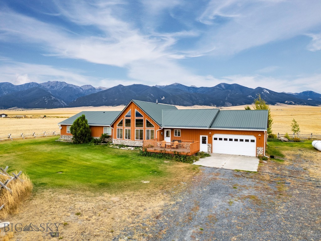 A private Montana acreage retreat offering mountain views, equestrian amenities, a heated shop, and the opportunity to enjoy animals, recreation, and the freedom of country living.

Set on 45.58± acres with expansive views of the Tobacco Root Mountains, 12 Bench Road offers privacy, tranquility, and space to enjoy the Montana lifestyle. The 2,858± square-foot home features 3 bedrooms, 2.5 bathrooms, an attached 2-car garage, soaring vaulted knotty pine ceilings, hardwood floors, and large windows that fill the home with natural light while capturing the surrounding landscape.

The spacious layout provides comfortable areas for everyday living, gathering, and entertaining, while the acreage and improvements extend the possibilities well beyond the home.

Outside, fenced and cross-fenced acreage, horse stalls, and additional outbuildings provide a functional setup for animals and country living. A heated shop offers valuable year-round space for equipment, vehicles, storage, hobbies, or projects.

Wake to mountain views, enjoy the peace and privacy of your own acreage, and spend your days making the most of the space around you. Whether your vision includes horses, animals, outdoor recreation, working on projects in the shop, or simply enjoying a quieter pace of life, 12 Bench Road offers the versatility to make it your own.

Surrounded by the natural beauty of southwest Montana and located near Whitehall, this property brings together acreage, privacy, functionality, and the opportunity to enjoy country living without the demands of a large-scale agricultural operation.

Schedule your private showing and experience 12 Bench Road for yourself.