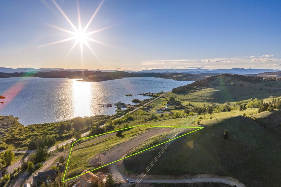 Welcome to your own private retreat. This exceptional 2-acre parcel overlooking Georgetown Lake offers breathtaking panoramic lake views and an unparalleled opportunity to build in one of Montana’s most sought-after recreational destinations.

A newly constructed road provides convenient access within this thoughtfully designed subdivision. The property is well and septic approved, features a 15,000-gallon fire protection water tank, and power has already been brought to the site making it well prepared for your future home or investment. Subdivision covenants allow for short-term rentals, adding excellent potential for vacation rental income.

Ideally located near an abundance of year-round recreation, you’ll enjoy easy access to the lake and boat launch, skiing at Discovery Ski Area, scenic hiking trails, golf at the renowned Old Works Golf Course, ATV and snowmobiling trails, and world-class fishing on Georgetown Lake. The charming historic towns of Philipsburg and Anaconda are just a short drive away, offering dining, shopping, and local culture.

This rare offering combines natural beauty, recreation, and convenience an extraordinary opportunity to create your dream home and experience the best of Montana lake living.