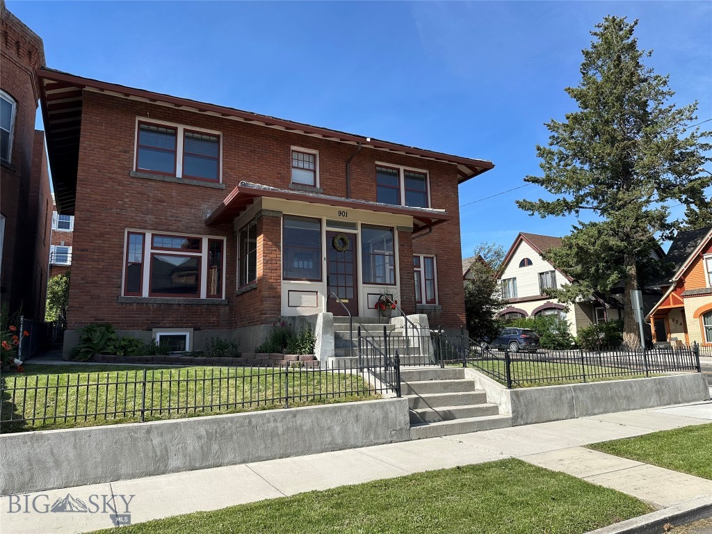 “FABULOUS” Remodeled 7 bedroom 2.5 bath home built in 1910. This beautiful brick home has been tastefully redone throughout with plenty of room for the whole family. Wonderful original woodwork & hardwood floors. Gas fireplace. U/G sprinklers. Attached garage. Corner lot. A definite must see!!!