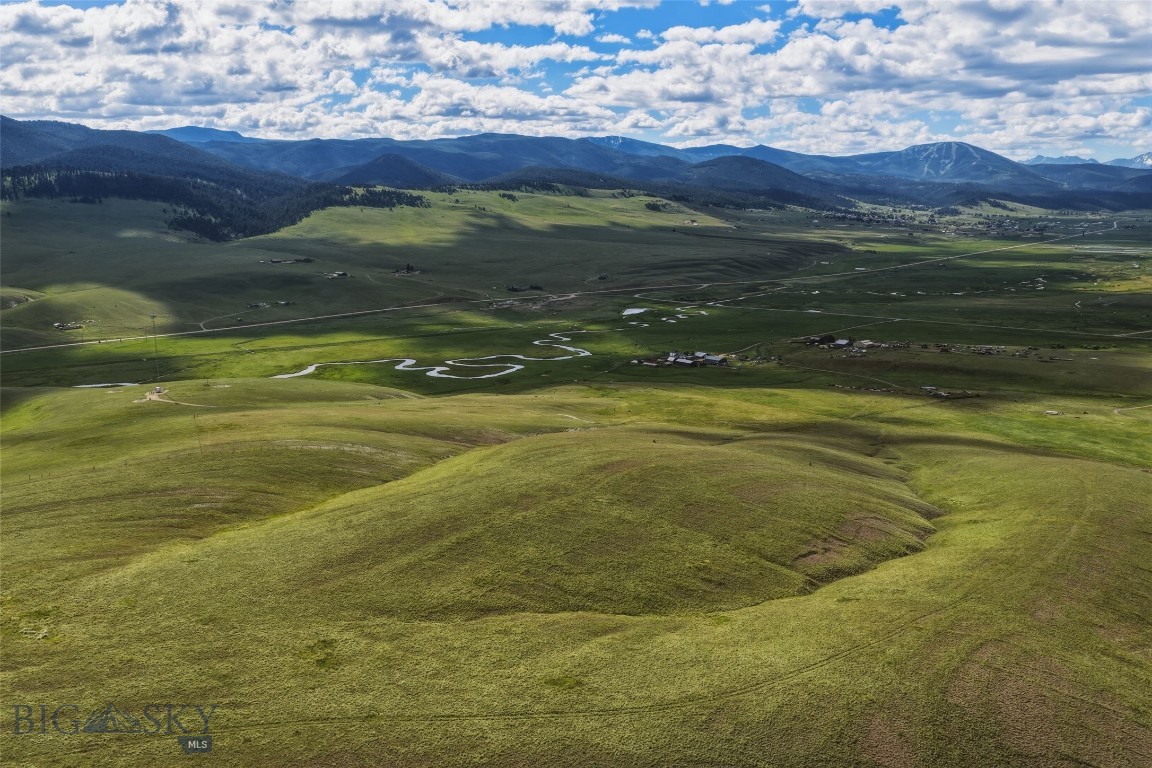 Discover 160 acres of Montana beauty just minutes from historic Philipsburg. Comprised of two contiguous parcels, this remarkable property captures panoramic views of the valley and the surrounding mountain ranges, offering a stunning backdrop of Montana's iconic Big Sky landscape. Rolling terrain, abundant wildlife, and an established building site create the ideal setting for a private residence, recreational retreat, or legacy land holding. Electricity is available to the build site, providing a valuable head start toward future development. The land offers privacy and seclusion while still maintaining convenient access to Philipsburg, Georgetown Lake, and Discovery Ski Area. Whether you're envisioning a custom home, seasonal getaway, or long-term investment, this property delivers the space, scenery, and flexibility to bring your Montana vision to life.