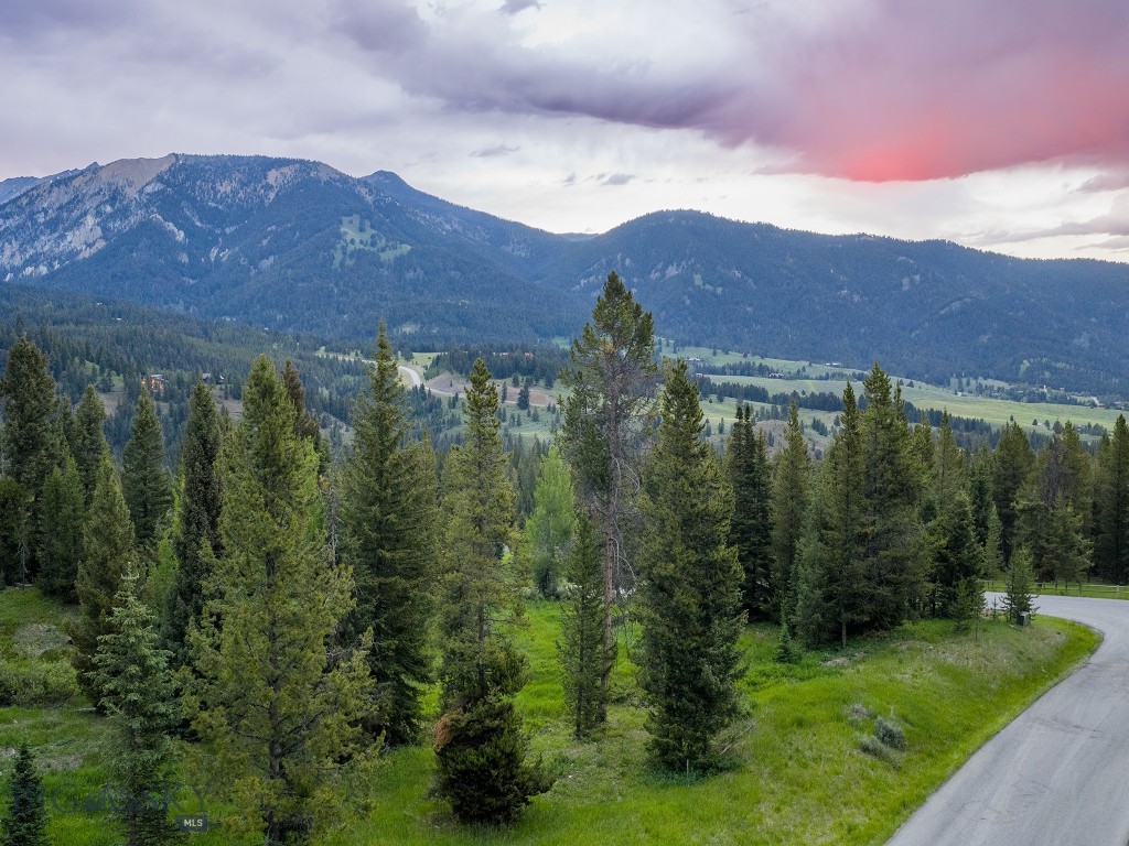 Now offered at $550,000, this exceptional 0.912-acre homesite in Big Sky's highly desirable Aspen Groves Subdivision presents an outstanding opportunity to build your mountain dream home.

Surrounded by mature forest, abundant wildlife, and the tranquility that defines Big Sky living, this property offers a rare combination of privacy, natural beauty, and convenience. Step directly onto the Big Sky trail system from your doorstep and enjoy year-round recreation, including hiking, biking, cross-country skiing, and endless opportunities to explore the surrounding landscape.

The lot captures beautiful views of Lone Mountain, providing a stunning backdrop in every season—from snow-covered winter peaks to vibrant summer sunsets. With nearly an acre of land, there is ample space to create a custom retreat that embraces both the scenery and the serenity of its surroundings.

Located within the exclusive Aspen Groves neighborhood, residents enjoy a peaceful, private setting while remaining just minutes from Big Sky Town Center, dining, shopping, golf, and world-class skiing at Big Sky Resort.
Properties in Aspen Groves rarely become available at this price point. Re-listed at $550,000, this is an exceptional opportunity to secure one of Big Sky's premier residential homesites and build the mountain lifestyle you've been dreaming of.