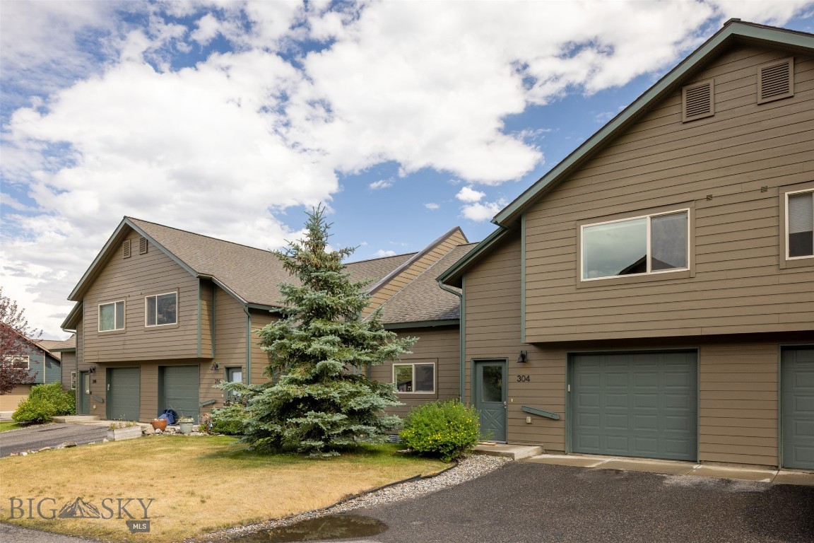 Thoughtfully updated and now offered furnished, this 3-bedroom, 3-bath Firelight Chalet is ready to enjoy from day one. A brand-new kitchen, new carpet, and fresh interior paint give the home a clean, modern feel, while vaulted ceilings and oversized windows bring warmth and natural light into the main living space. The well-designed layout includes a main-level bedroom, two upstairs bedrooms, three full baths, an attached one-car garage, and a private patio for enjoying the surrounding mountain setting. Just minutes from Big Sky Town Center, Ousel Falls, dining, trails, and year-round recreation, this chalet offers an easy fit as a mountain getaway, full-time residence, or investment property.