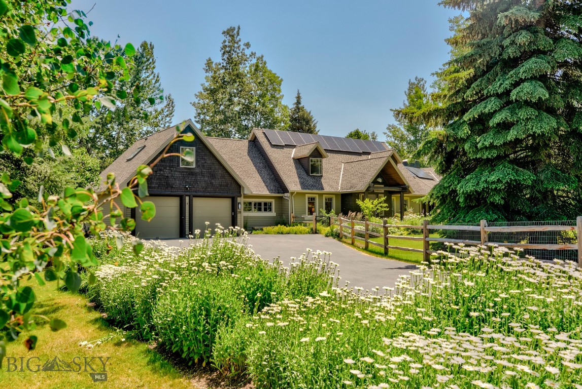 Welcome to an exceptional home located in the sought-after Gardner Park area on Bozeman's south side. This exquisite 4-bedroom, 3.5-bath residence is situated on a beautifully landscaped and fully fenced 1-acre lot, featuring multiple outdoor spaces, mature trees, and Limestone Creek meandering along the back property boundary.

The main level of this warm and welcoming home offers a primary suite with patio access, a walk-in closet, separate dressing room, and a 5-piece bath. The chef’s kitchen is equipped with Viking appliances, granite countertops, a spacious island, and a caterer's prep area or additional pantry space. The kitchen opens to a sitting room and dining area with access to the backyard. Additionally, the large living room showcases a wall of windows and rich wood flooring.

The second level features three spacious bedrooms—one with a private balcony and separate access to the lower level—along with two full bathrooms and a flex space.

Additional amenities include:

- A large garden shed for outdoor equipment.
- 54 solar panels that significantly reduce electric costs.
- A fully fenced yard for pets.
- Multiple outdoor entertaining spaces.
-2 furnaces
-Central Air
-Front yard fire pit
-In floor radiant heat in bathrooms
-Open Space to the North
