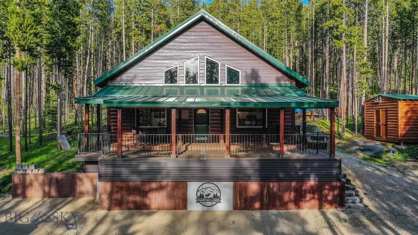 Your four-season Montana headquarters awaits at Georgetown Lake! This inviting cabin features a cozy 2-bedroom, 1-bathroom layout with an additional loft in the main house, plus a brand-new deck perfect for entertaining and taking in the mountain air. The true star of this property is the massive, oversized garage—specifically built for storing boats, snowmobiles, side-by-sides, and all your outdoor gear. Above the garage, you'll find a huge bonus loft/living area that offers endless potential as a guest bunk room or expansive game room. The location is unbeatable: you are mere minutes from the water's edge, surrounded by Beaverhead-Deerlodge National Forest trails for riding right out your door, and just a quick drive to Discovery Ski Area. Nestled between the charm of Philipsburg and Anaconda. Offered partially furnished (inventory list provided), with additional items negotiable. Whether you're seeking a lucrative vacation rental or a private family legacy getaway, this property delivers.