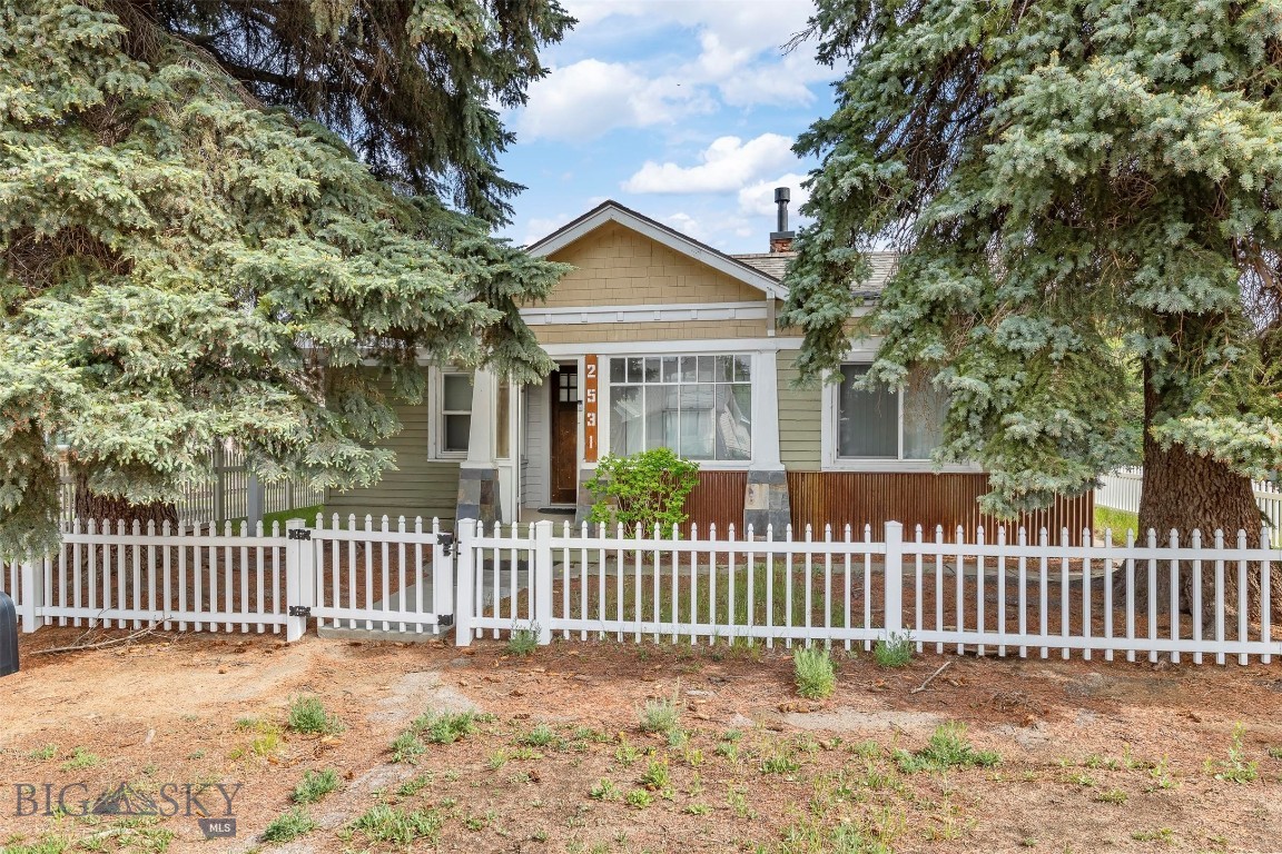 Charming and Move-In ready! 2 bed 1 bath Craftsman home offers comfort, character, and functionality all in one. Layout includes a living area, dining space, and convenient main-level laundry. Step outside to enjoy the covered front porch, large back deck, and fully fenced yard. Perfect for entertaining, pets, or relaxing outdoors. This home is a great opportunity for first time home buyers, downsizers, or investors alike.
