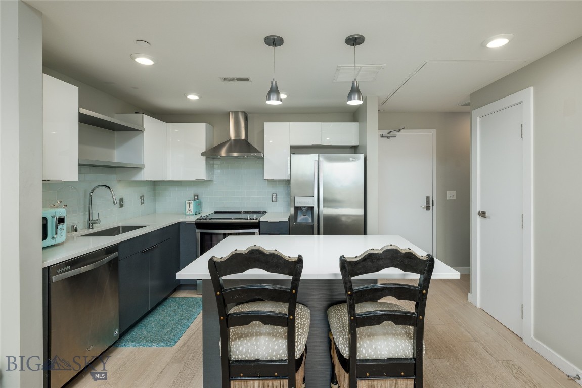 Third floor 1 bed 1.5 bath unit with private balcony that takes in the stunning Bridger mountains views. Welcome to the Talbach House Condos. These units offer south side Bozeman location, close to Montana State University and just 10 minutes to downtown Bozeman. The condos offer dedicated covered parking, private/secure front entrance and elevator service. This modern design coupled with the light finishes offer a bright and open layout. The condo entrances offers a stacked washer/dryer, half bath and dedicated storage/coat closet. Upon entering the open kitchen/living space you will notice the abundance of light and the views to the Bridgers. Enjoy your morning coffee on the glassed walled balcony with room to entertain. Off of the living room is the primary bedroom with a large closet and elegant bathroom. This unit has been well cared for and offers the convenience and location that many assets at this level ca not match. The neighborhood does have walking trails, parks and recreational opportunities that are close by.