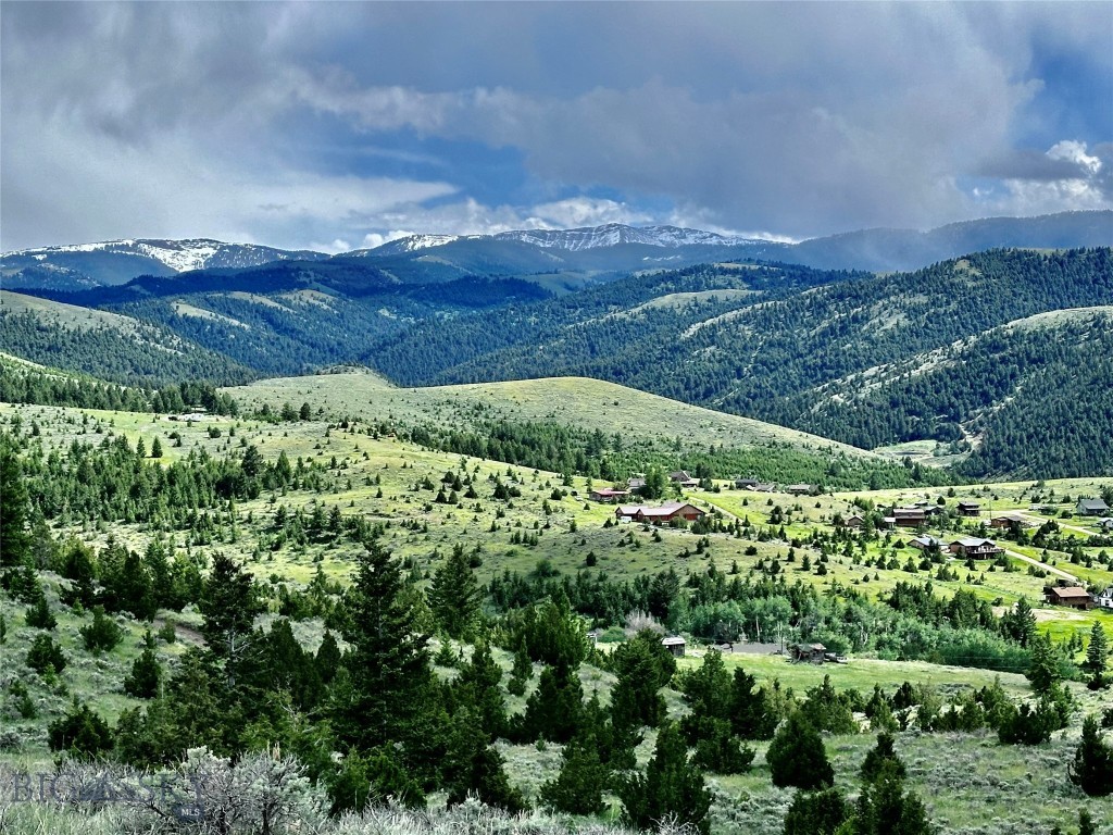 At 5761' in elevation you will find 199 lots that are part of the Original Virginia City town Plat for sale at at less than $2000 per lot. The total is over 21 acres and you can build your dream home on the 13.5 adjoining blocks giving you 17+/- contiguous acres among the trees looking at the massive views of the mountains. Investors check out the map as there could be potential for selling off some of the lots-blocks to recoup a portion of your investment. "Come experience where Montana's history lives," the mantra for Virginia City, the richest placer gold strike in the Rocky Mountains.  As the first Montana Territorial Capital (1865-1875) VC quickly became the gun slinging, vigilante hanging, gold digging center of tales in the wild west frontier. Today, VC and it's population of just over 200 residents, has become a state protected park and is being preserved on the National Register of Historic Landmarks. RECREATIONAL OPPORTUNITIES include hunting, hiking, fishing, snowmobiling, panning for gold, and so much more. In Montana you don't just buy a property......you purchase a new lifestyle!! Come live in the WILD WEST!