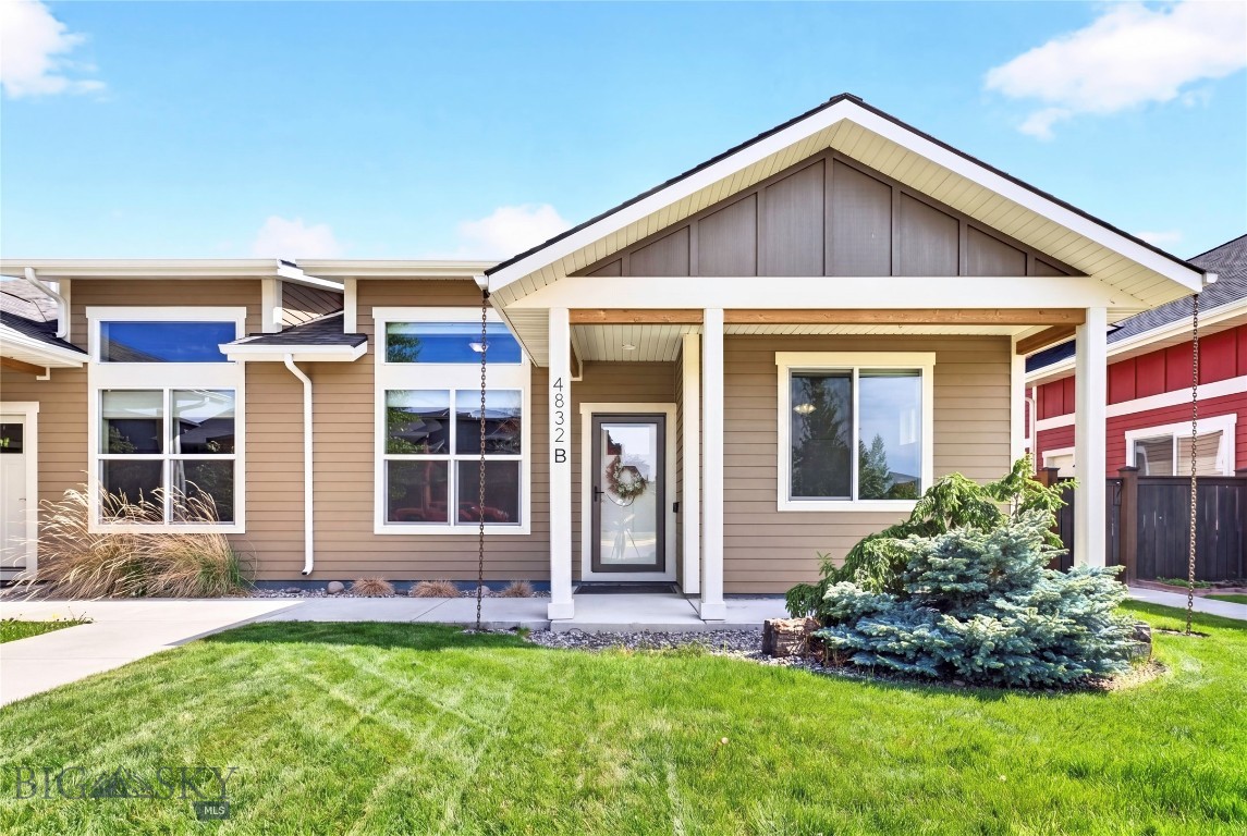 Enjoy the ease and convenience of single-level living in this thoughtfully updated condo located in Bozeman's desirable Loyal Gardens neighborhood. Ideally situated near shopping, dining, schools, parks, and everyday conveniences, this home offers a unique combination of comfort, character, and functionality. Step inside to soaring ceilings and a welcoming living room filled with natural light. Just off the main living area are two generously sized bedrooms, a full bathroom, and a convenient laundry space. The front bedroom features a Murphy bed, creating flexibility for guests, a home office, or additional living space, while the second bedroom is generously sized and features a spacious closet. The living room flows into the dining area, where a custom electric fireplace creates a warm focal point between the dining space and kitchen. A custom accent wall adds additional character and style. Tucked privately toward the back of the home, the primary suite features a large walk-in closet with built-ins and a beautifully remodeled bathroom complete with a soaking tub, tile shower, and abundant natural light. Just off the primary suite, you'll find a convenient mudroom space leading to a charming courtyard and one of the home's most distinctive features. Relax year-round in the Canadian extra-deep soaking hot tub tucked beneath the covered breezeway, creating a private outdoor retreat rarely found in condo living. From there, access the garage, which has been thoughtfully converted into a heated bonus room featuring barnwood and steel accents, custom lighting, and the perfect setting for a home theater, game room, gym, or hobby space. Adjacent to the bonus room is a workshop complete with handcrafted workbench and shelving. A two-car carport completes this exceptional outdoor area. Meticulously maintained and truly one of a kind, this residence showcases an impressive level of craftsmanship and attention to detail, with thoughtful upgrades evident throughout the property.