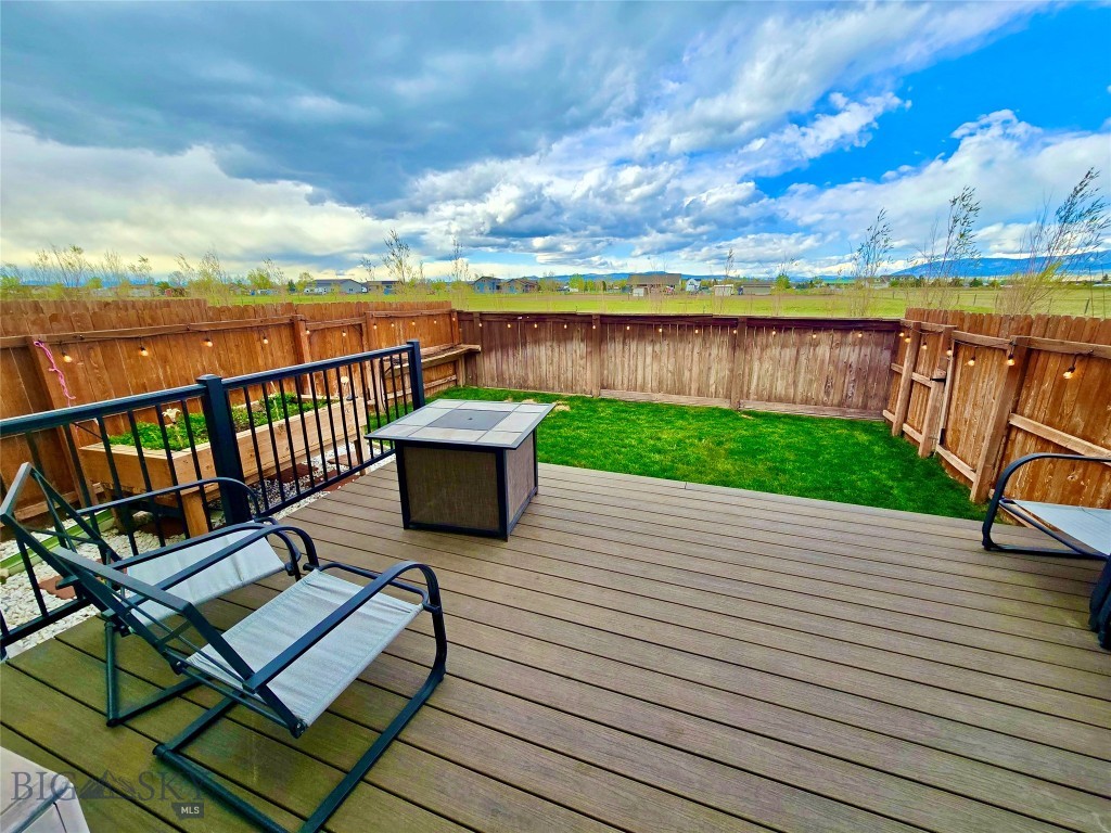 Welcome to your Montana condominium nestled in the heart of Belgrade's sought-after River Rock community. This beautifully maintained 3-bedroom, 2.5-bath condo offers 1,406 square feet of comfortable living space with stunning unobstructed views of the iconic Bridger Mountains. Built in 2004 and thoughtfully updated, the home features a remodeled kitchen, new living room carpet, new roof, cozy gas fireplace, and a water softener. One highlight includes a primary bedroom with an enuite primary bathroom. Step outside to your fenced backyard retreat, complete with a sprinkler system and raised garden beds. The attached heated garage with hot and cold water spigots adds everyday convenience, while the quiet, well-kept HOA community keeps the neighborhood looking its best year-round. Location is everything, and this property delivers. Situated just minutes from Bozeman Yellowstone International Airport and the vibrant city of Bozeman, you'll enjoy effortless access to world-class skiing at Bridger Bowl and Big Sky Resort, blue-ribbon fly fishing on the Madison and Gallatin Rivers, hiking, rafting, and the boundless adventure that defines Montana living. Yellowstone National Park is just 90 minutes away, and the Museum of the Rockies is right around the corner. Whether you're an outdoor enthusiast, a nature lover, or simply looking for a welcoming community to call home, this Belgrade beauty checks every box.