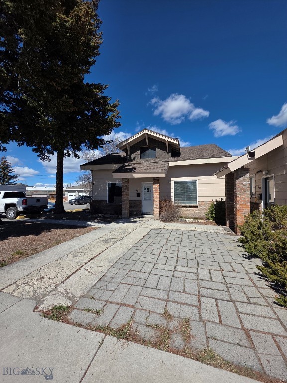 Prime Investment property in a Prime location!  This property has so much potential to be so many things.  This is considered a duplex with a detached 5 car garage, 3 bedrooms and 2 baths.  Come check it out, do your due diligence on the zoning, map out the location and bring your ideas to life!  Investors come bring your offers!