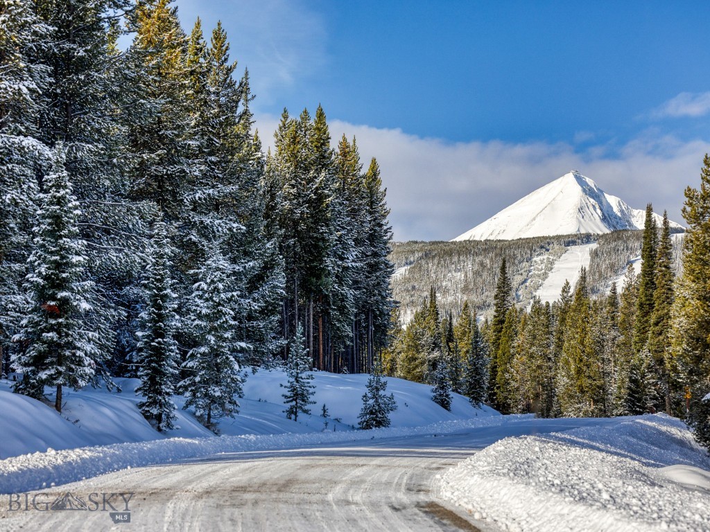 Sited in Big Sky’s idyllic landscape, this 3.44-acre lot in Spanish Peaks North offers an unparalleled opportunity to immerse yourself in the serenity and grandeur of Montana’s wild beauty. Priced at $1,700,000, this property is more than just land—it’s a canvas for your vision of mountain living amidst towering pines and vibrant aspen groves. One of the standout features of this lot is its gently sloping topography, which creates an ideal blend of usability and visual drama. The terrain naturally enhances the potential for a multi-level home with walkout spaces or panoramic windows that frame the spectacular scenery. For those envisioning a custom build, the land's contours inspire creativity—elevated viewpoints could capture sunrise over the mountains or sunsets that light the forest in golden hues. While the property feels worlds away, it’s just a short drive to the vibrant Town Center, where boutique shops, gourmet dining, and cultural events bring together locals and visitors alike. The proximity to year-round recreation is equally impressive. Despite its proximity to amenities, this lot offers privacy, too. The dense forest acts as a natural barrier, muffling noise and shielding the property from view. Whether you’re envisioning evenings by a crackling fire pit under the stars or mornings spent with a coffee in hand, listening to the wind whisper through the trees, this property provides a peaceful refuge that’s increasingly hard to find in a growing community. As Big Sky continues to flourish, purchasing this lot not only secures your piece of Montana’s paradise but also presents an investment opportunity. With its unique combination of size, location, and natural features, this property stands out as a rare find in an already sought-after market. Imagine designing a home that seamlessly blends with this unique environment—perhaps a modern lodge with soaring ceilings and expansive glass walls, or a rustic log cabin with cozy interiors and an inviting deck. With nearly three and a half acres to work with, there’s ample space to include thoughtful touches like a guesthouse, outdoor living spaces, or even private trails. This property encourages you to dream big while remaining grounded in the beauty of the land itself.  Opportunities like this don’t come along often. Whether you’re planning a vacation retreat, a forever home, or simply investing in a piece of Montana’s unmatched wilderness, this property is poised to exceed your expectations.