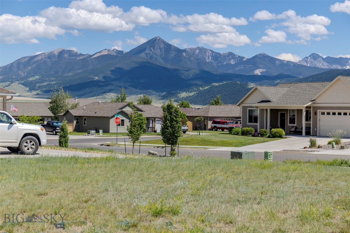 This is a beauty!  This good sized lot is larger than most in our area at 7949 Sq Ft, it is level and your builder will love that, and the sidewalks have been completed on all sides of this corner lot.
Face  your home to the south on Ordway Drive and pick up views of the mountains that Livingston is famous for. Or position it to the west facing Floyd Way and have a private back yard with views.  On a paved city street with city water, city sewer and natural gas lines already to the lot. Discovery Vista has a private park and trails that give the area a sense of community.  Imagine your new home built here and the area becoming your base camp for fishing, hiking, biking, skiing. Livingston in approximately 50 miles from Yellowstone National Park, in Montana, that is 3 stop lights away. Bozeman and it's International airport is about 30 to 45 minutes away.