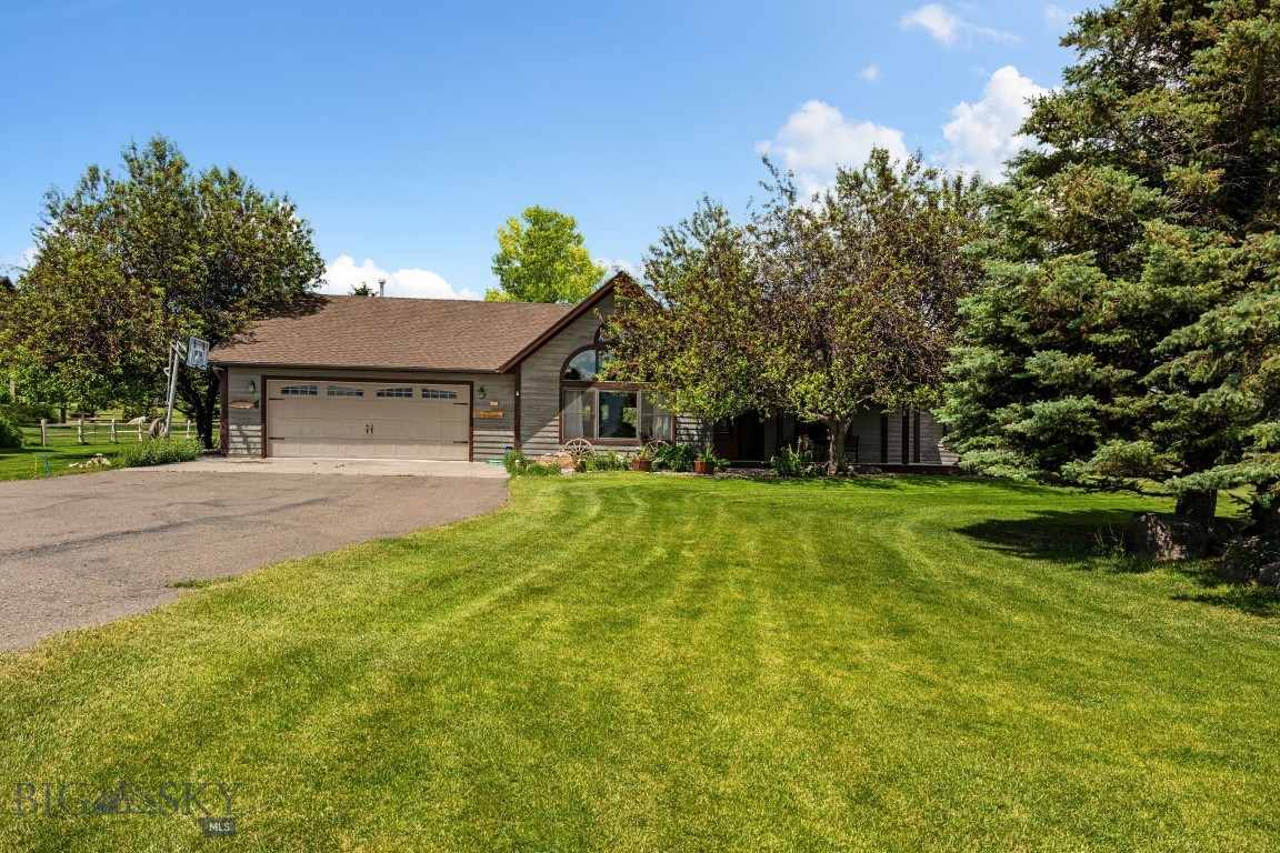 Welcome HOME to 45 Sphinx Mountain Court; breathtaking Madison Range views, golf course frontage, & the charm of Montana living come together in one of the Madison Valley's most sought-after neighborhoods. Situated on a spacious 0.60± acre cul-de-sac lot on the west edge of Ennis, this single-level home offers 4 bedrooms, 2 bathrooms, & 2,134± sq ft of comfortable living space.

The home's light-filled open-concept floor plan was designed for both everyday living & ease of entertaining. A spacious living, dining, & kitchen area features warm wood flooring, a stunning tongue-and-groove pine vaulted ceiling, & expansive windows that frame panoramic mountain views. The well-appointed kitchen offers generous cabinetry, a large island perfect for serving & gathering, & picturesque golf course views from the kitchen sink.

The primary suite provides a private retreat with ample space, a large walk-in closet, & an impressive ensuite bathroom complete with a soaking tub, tiled walk-in shower, & dual vanities. Three additional bedrooms & a guest bathroom offer flexibility for family, guests, and/or a home office.

Outside, sip your morning coffee while watching the sunrise from the covered front porch, then unwind in the evening on the spacious covered back patio as the sun sets over the western hillside. The yard space provides elbow room w/out excessive maintenance. The attached 2-car garage offers space for vehicles, recreational gear, & outdoor toys. Addt'l features include central AC, cathedral ceiling, & exclusive golf course frontage on the Valley Garden Golf Course.

Located directly across from the Madison Valley's rodeo & fairgrounds & less than 2 miles from downtown Ennis, you'll enjoy convenient access to local dining, shopping, groceries, medical services, & western community events. World-renowned fly fishing on the Madison River is just minutes away, while Ennis Lake, public lands, hiking trails, horseback riding, hunting, wildlife viewing, & countless recreational opportunities await nearby.

Conveniently located ~ 51 miles from Bozeman, 55 miles from Bozeman Yellowstone International Airport, 72 miles from Yellowstone Nat'l Park, & 14 miles from historic Virginia City. Properties offering this combination of golf course living, spacious lots, mountain views & proximity to premier outdoor recreation are increasingly difficult to find. Experience the western small-town Montana lifestyle you've been dreaming of at 45 Sphinx Mountain Court.
