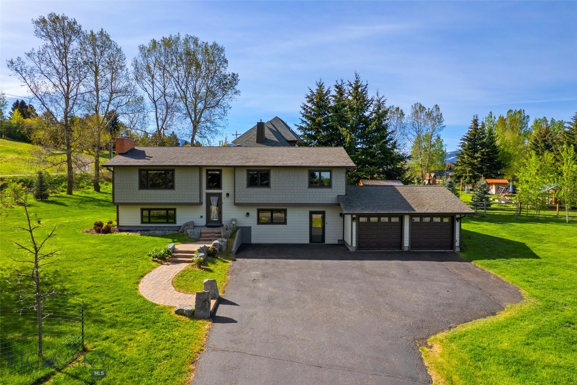 Step into this meticulously maintained 4-bedroom, 3-bath split-level home situated on a beautifully landscaped 0.61-acre lot in the heart of South Bozeman. Thoughtfully updated throughout, this property features a renovated kitchen, a custom office addition, and numerous quality upgrades designed for both comfort and functionality.

The bright office/den overlooks mature trees, creating a peaceful workspace or retreat. Cozy gas fireplace and spacious living areas on both the main level and lower level provide plenty of room to relax and entertain. The home also offers abundant storage and a main-floor primary suite for added convenience.

Outside, enjoy the large, private yard with mature landscaping and easy access to neighborhood trails. With ample garage space for hobbies, gear, and toys, this property is ideal for Montana living. Conveniently located off Sourdough Road, you’re just minutes from downtown Bozeman, the hospital, schools, and endless recreation opportunities.

This move-in-ready home combines space, comfort, and an unbeatable location, schedule your showing today!