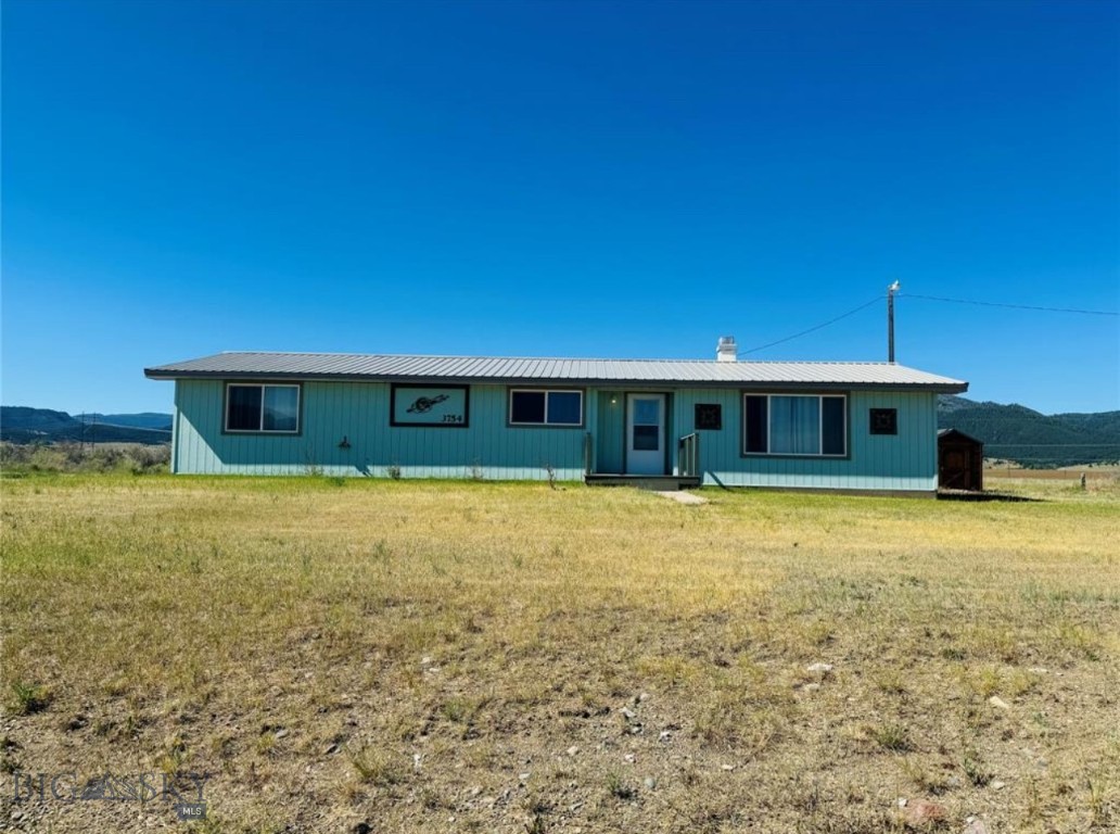 Look at 3754 Crackerville Road in beautiful Anaconda — a rare opportunity to own a slice of Big Sky Country with rich history, wide-open views, and recreational possibilities. This property blends rustic charm with Montana’s natural beauty, all just minutes from Fairmont Hot Springs Resort and the breathtaking Anaconda-Pintler Wilderness. Set on a spacious parcel, the property features a classic Montana home with some of the original historic Crackerville buildings that tell the story of the region’s heritage. Whether you’re drawn to the architectural character of the past or looking for space to create your dream homestead, this property offers an unmatched combination of setting and potential. Enjoy nearby hiking, fishing, skiing, and soaking in natural hot springs, all within a short drive. The Pintler Scenic Loop and Georgetown Lake provide year-round adventure perfect for outdoor enthusiasts, history lovers, or anyone seeking peaceful country living close to town amenities.