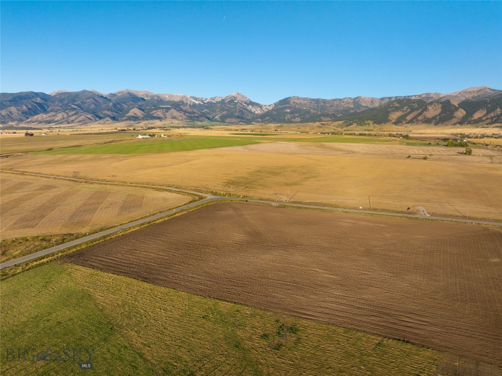 Experience the best of Montana living at Penwell Bridge Farm, a new offering where expansive views meet rural elegance. Perfectly positioned beside the renowned Amaltheia Organic Dairy, these 2.5 -3.5 acre parcels capture some of the most breathtaking scenery in the Gallatin Valley. The Bridger Mountains rise to the east while surrounding farmland and open skies frame the landscape to the west. It creates the perfect backdrop to build your dream home. Light covenants allow for multiple dwellings and rental opportunities of seven days or longer. Whether you’re seeking space or the freedom to build a truly custom retreat, Penwell Bridge Farm delivers. Just minutes from Bozeman, residents will enjoy easy access to dining, shopping, and recreation, while returning home each day to peace, views, and fresh country air. With Amaltheia’s CSA pick-up and seasonal U-Pick flowers right next door, local connection and natural beauty are quite literally part of the neighborhood. Don’t miss the opportunity to claim one of these one-of-a-kind homesites, where every sunrise over the Bridgers reminds you why you chose Montana.