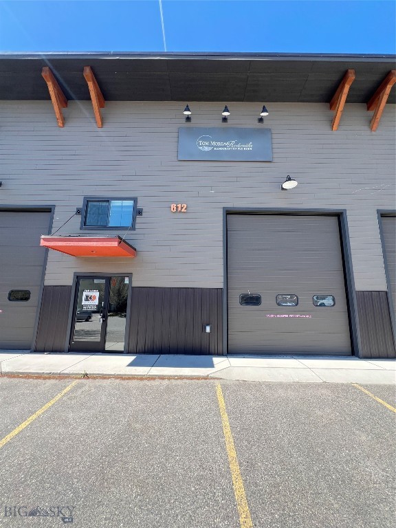 Warehouse/office just East of the North 7th/Griffin intersection.  Main floor = 300 SqFt finished office, and 2100 Sqft of warehouse with small bathroom/shower. Mezzanine over office is approximately 428 SqFt.    12'x16' overhead door & separate main floor office entrance.  Owner prefers 2-year minimum lease.