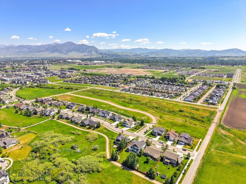 Welcome to Meadow Bridge, Bozeman’s newest premier neighborhood located on the highly desirable south side of Bozeman. This thoughtfully planned subdivision features 45 fully entitled homesites ranging from approximately 4,000 to 14,000 square feet—offering the perfect setting to bring your custom dream home to life.

Meadow Bridge is also one of the last remaining subdivisions within the city limits dedicated exclusively to single-family homes, making it a rare opportunity for those seeking a traditional neighborhood setting with no multi-family development.

Residents will enjoy stunning views of the Bridger Mountains, enhanced privacy, and convenient access to nearby parks and open space. The community is ideally situated just minutes from historic downtown Bozeman, offering easy access to dining, shopping, recreation, top-rated schools, and Montana State University.

This particular homesite is one of the larger lots in the subdivision and is located adjacent to open space, providing additional privacy and a more expansive feel. With generous lot sizes and flexible design possibilities, you have the freedom to create a home that truly fits your lifestyle—whether you envision a modern farmhouse, a charming cottage, or a thoughtfully designed two-story home.

Bring your builder and start planning your future in Meadow Bridge—where the comfort of a close-knit neighborhood meets the convenience and beauty of living in Bozeman.