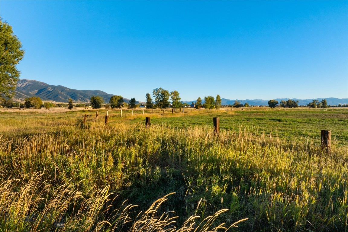 Experience the best of Montana living at Penwell Bridge Farm, a new offering where expansive views meet rural elegance. Perfectly positioned beside the renowned Amaltheia Organic Dairy, these 2.5 -3.5 acre parcels capture some of the most breathtaking scenery in the Gallatin Valley. The Bridger Mountains rise to the east while surrounding farmland and open skies frame the landscape to the west. It creates the perfect backdrop to build your dream home. Light covenants allow for multiple dwellings and rental opportunities of seven days or longer. Whether you’re seeking space or the freedom to build a truly custom retreat, Penwell Bridge Farm delivers. Just minutes from Bozeman, residents will enjoy easy access to dining, shopping, and recreation, while returning home each day to peace, views, and fresh country air. With Amaltheia’s CSA pick-up and seasonal U-Pick flowers right next door, local connection and natural beauty are quite literally part of the neighborhood. Don’t miss the opportunity to claim one of these one-of-a-kind homesites, where every sunrise over the Bridgers reminds you why you chose Montana.