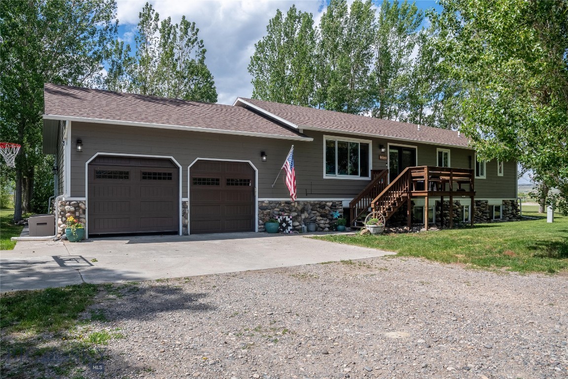 Welcome to this beautifully custom-built home offering the perfect blend of comfort, functionality, and Montana beauty. Designed with families in mind, this spacious home features an ideal floor plan with a primary suite and an additional bedroom on the main level, along with two full bathrooms. The lower level offers three additional bedrooms and a full bath, providing plenty of space for family and guests.

The heart of the home is the thoughtfully designed custom kitchen, featuring handcrafted cabinetry, a gas range, farmhouse sink, and an oversized island that provides abundant workspace and seating. Large windows throughout the home fill every room with natural light, creating a warm and inviting atmosphere.

Step outside to enjoy the privacy of this exceptional property, surrounded by mature trees and fragrant lilac hedges that create a peaceful setting. Take in the stunning views of the Crazy Mountains from your own backyard while enjoying the tranquility of country living.

Additional features include an attached two-car garage and a spacious pole barn with plenty of room for recreational vehicles, equipment, and all your Montana toys.

Located in the desirable Mallard Springs Subdivision, property owners enjoy shared private access to the Yellowstone River for fishing, floating, and recreation. Despite its private setting, this home is just a short 7-minute drive to Big Timber, offering convenient access to shopping, dining, schools, and community amenities.

If you're looking for a custom home with exceptional privacy, breathtaking mountain views, and access to one of Montana's most treasured rivers, this property is a must-see.