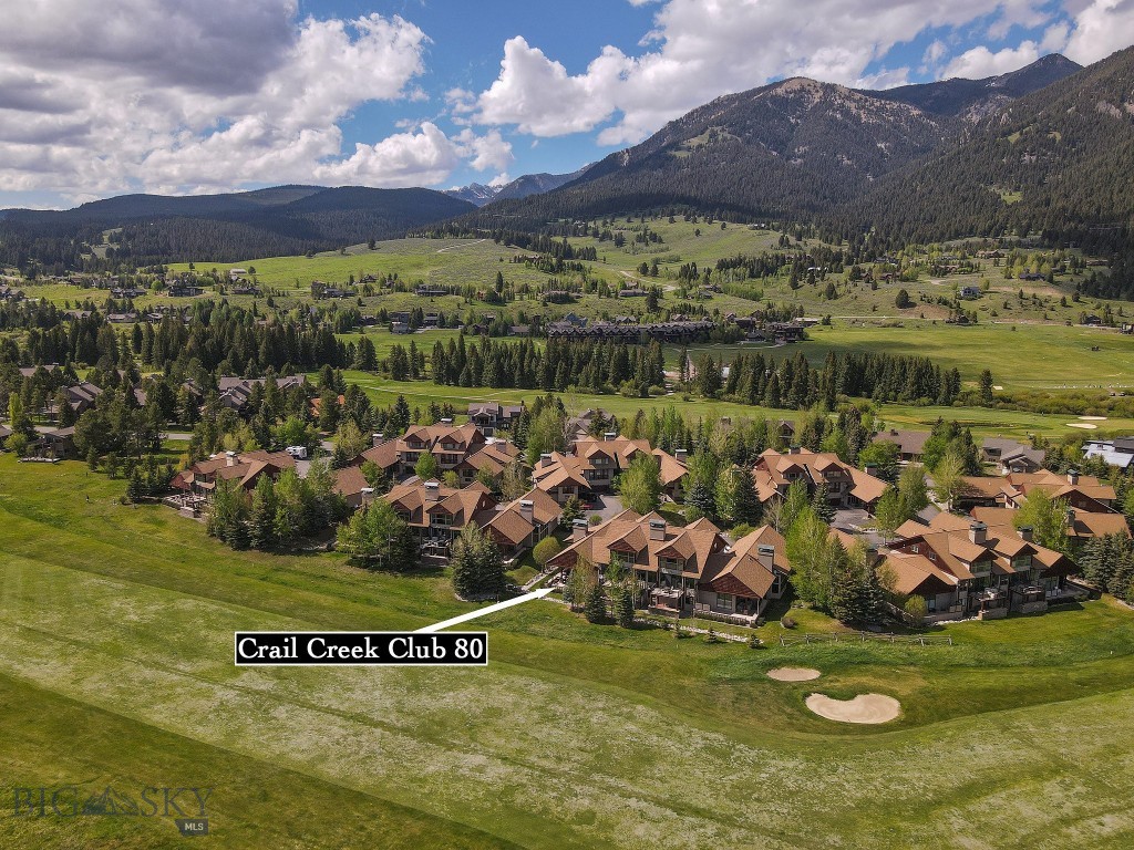 One of the most extensively renovated condos in Crail Creek Club is #80, where modern luxury meets Montana serenity. An end unit, positioned on the 10th fairway of the Big Sky Golf Course, this 2,180 sq ft residence has been transformed into a fully turnkey retreat with finishes and smart home features rarely found in the Meadow Village. From this excellent, walkable location, Nordic ski from your back deck, or hike on one of the many local trails.  Big Sky Resort is a short drive away as well as rafting or fishing on the Gallatin River, playgrounds, skateboarding, dining, boutique shopping, art galleries, and pickle ball nearby with great proximity to the Big Sky Medical Center.
Every detail has been elevated: quartz countertops throughout, renovated bathrooms with imported Italian and Spanish tile, and metal tile, a Blanco kitchen sink, freshly painted, new furniture, area rugs, designer lighting, curated wallpaper, and a newly added foyer closet. Two private owner lock off closets provide secure storage for second home or rental use.  Relax on a chilly day and enjoy TV on the newly installed Mantle Mount above the Living Room fireplace.
The redesigned laundry room features a wash tower and utility sink, adding storage, convenience and functionality to the main level.
Step outside to a large Azek/TimberTech deck, partially covered for rain or shine enjoyment, complete with outdoor furniture included. Vaulted ceilings and south facing windows flood the main level with natural light, while insulated Roman shades and UV sheers provide comfort and privacy.
The home is designed for effortless living. Hydronic, energy efficient electric heaters controlled with Mysa smart thermostats, hard wired Ring security cameras, and an app controlled smart garage door allow complete remote management. Four electric fireplaces and a wood burning centerpiece add warmth and ambiance.
The spacious lower level is a sanctuary of possibility—whether envisioned as a movie lounge, office, wellness spa with infrared sauna, or additional guest suite. Upstairs, guests enjoy a queen over queen bunk room, an airy loft with daybed, and abundant storage. The home sleeps 6+ comfortably, making it ideal for hosting or rental flexibility.
An oversized heated garage provides exceptional storage for gear, vehicles, and seasonal items, enhancing the property’s turnkey appeal.
This is more than a renovated home—it is a fully realized lifestyle, ready to enjoy from day one.