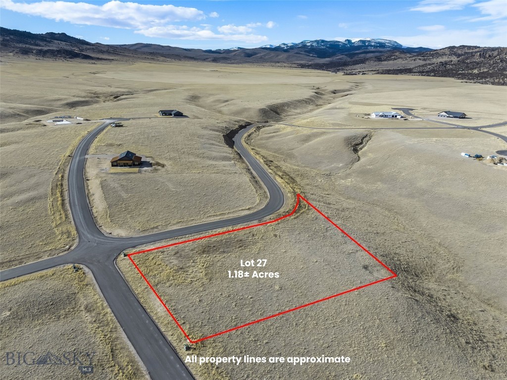 Lot 27 offers 1.12± acres within a thoughtfully planned 55-lot community, with parcels ranging from approximately 1 to 2 acres. The subdivision spans 165± acres total, providing generous open space and excellent opportunities to enjoy local wildlife. Paved roads are in place, with mailboxes, power, and fiber optic service to each lot. Located approximately three miles from downtown Ennis, this property offers sweeping views in all directions and convenient access to town amenities. Wells throughout the subdivision range from approximately 200 to 350 feet in depth, producing 12 to 60± GPM. The licensed Montana listing agent is a member of the selling entity.