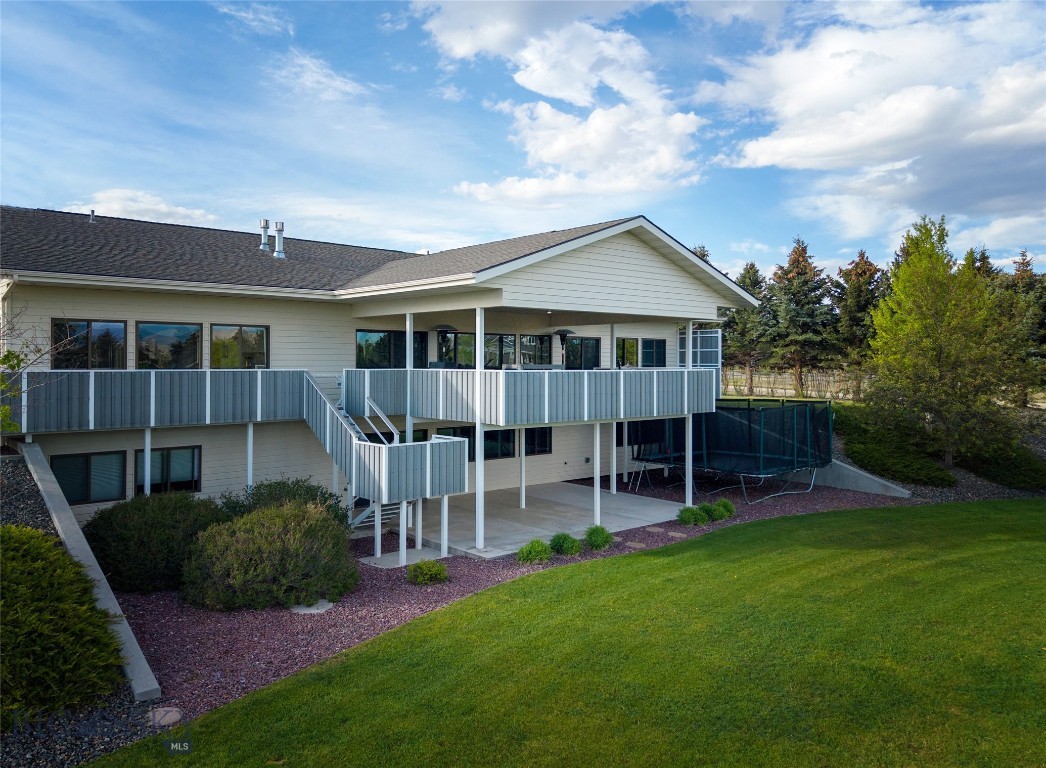 Enjoy breathtaking mountain views from the covered deck of this contemporary 6,140-square-foot custom home situated on 1.18 acres in one of Dillon’s premier subdivisions, with 10 acres of adjacent parkland enhancing the privacy and open feel of the property. Thoughtfully designed with quality craftsmanship, modern amenities, and energy-efficient features, this well-built home offers a bright, open floor plan and exceptional attention to detail throughout.  The main level provides convenient single-level living with two bedrooms and three bathrooms, including a brand-new primary en suite featuring a soaking tub, dual-head shower, and custom cabinetry. A bonus room offers flexible space ideal for an office, crafts, or hobbies. The kitchen is well-appointed with double ovens and two pantries, while the home’s natural gas service and on-demand tankless water system add comfort and efficiency. The finished walk-out basement includes two additional bedrooms and two full bathrooms, along with a spacious area perfect for a media or entertainment room. Furnishings for the downstairs includes the sofa, pool table, ping pong table, poker table and weight set. Both levels feature beautiful gas stone fireplaces, and extensive windows throughout the home fill the interior with natural light while showcasing Montana’s stunning landscape. An unfinished sauna room provides additional opportunity to customize the space to your needs. Outdoor amenities are equally impressive, including a patio wired for a hot tub, a large chicken run, drip irrigation, and an advanced 16-zone underground irrigation system. Additional highlights include 400 amp electrical service, a heated three-car garage with floor drain, generous storage spaces, a newer (2021) composite roof and low-maintenance Trex decking. The outdoor gas grill currently installed on the deck and connected to the property’s natural gas service will convey.  Also, trampoline next to the deck can stay. This exceptional property combines luxury, functionality, and peaceful Montana living in a truly remarkable setting. Call for a showing today!